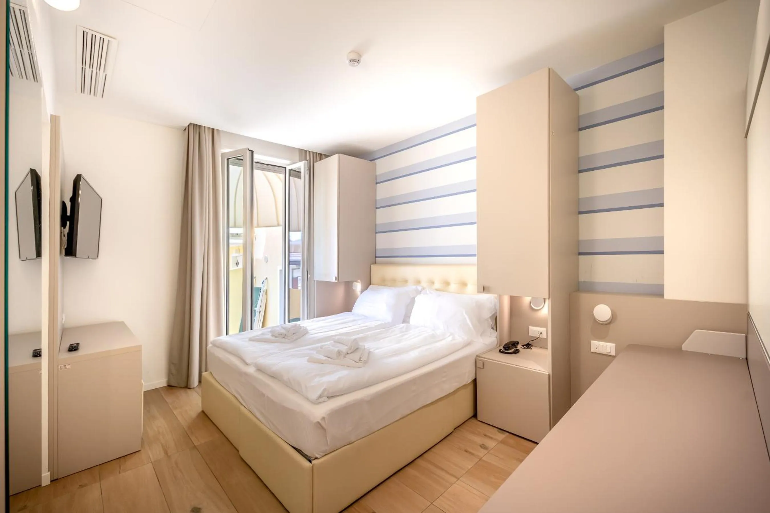 Bedroom in Hotel Le Lampare