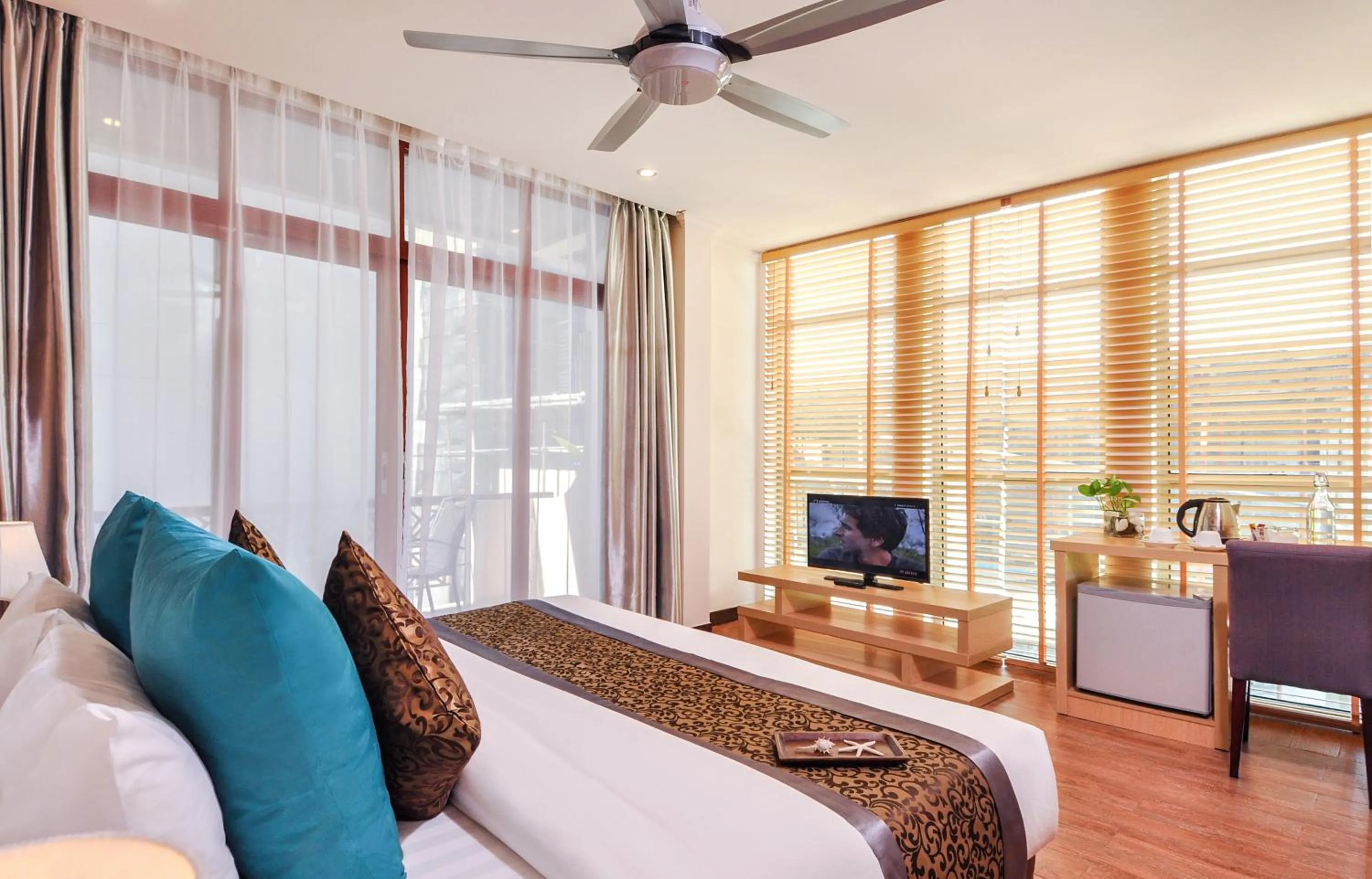 Bed in Triton Beach Hotel & Spa