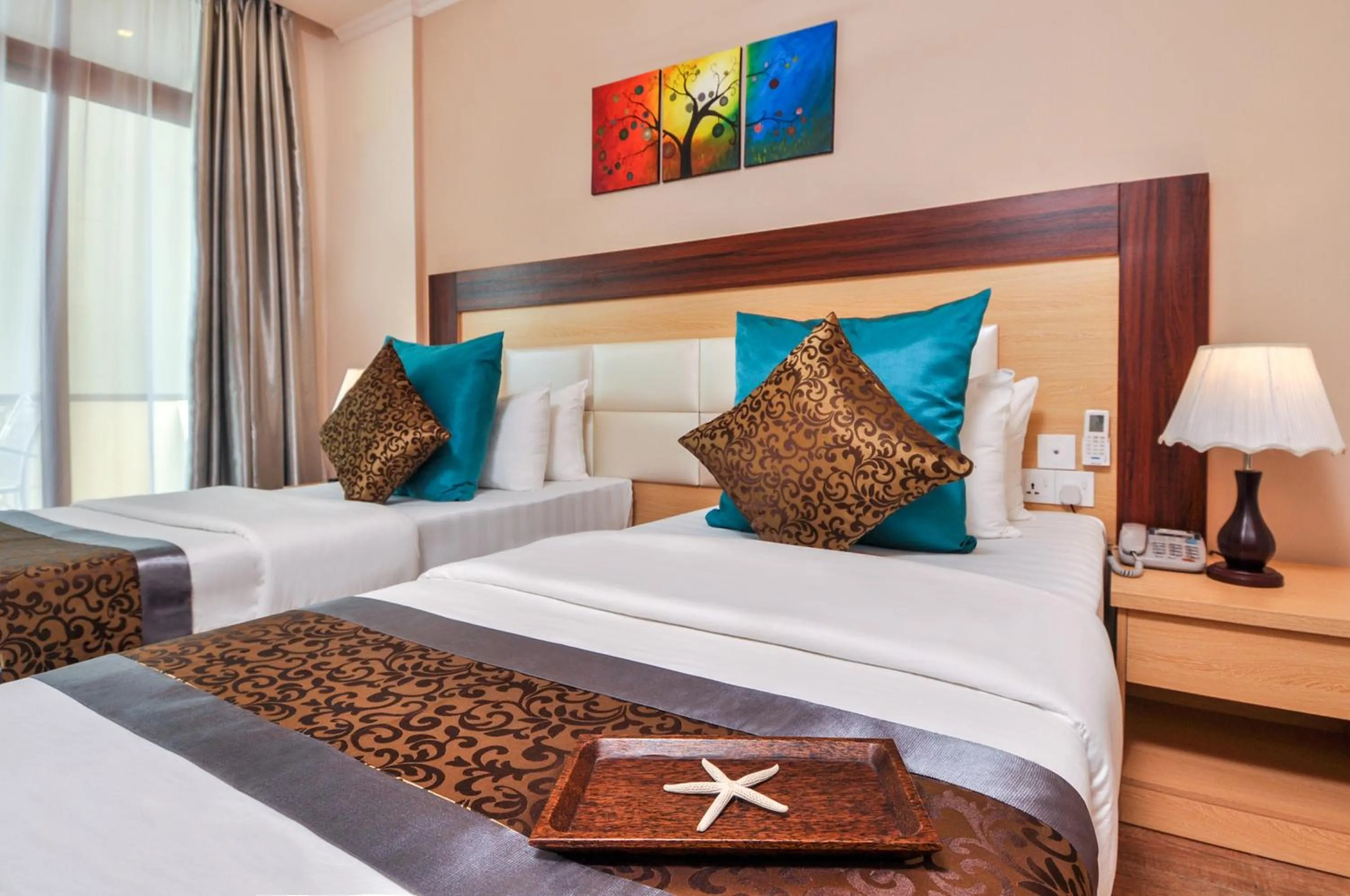 Bed in Triton Beach Hotel & Spa