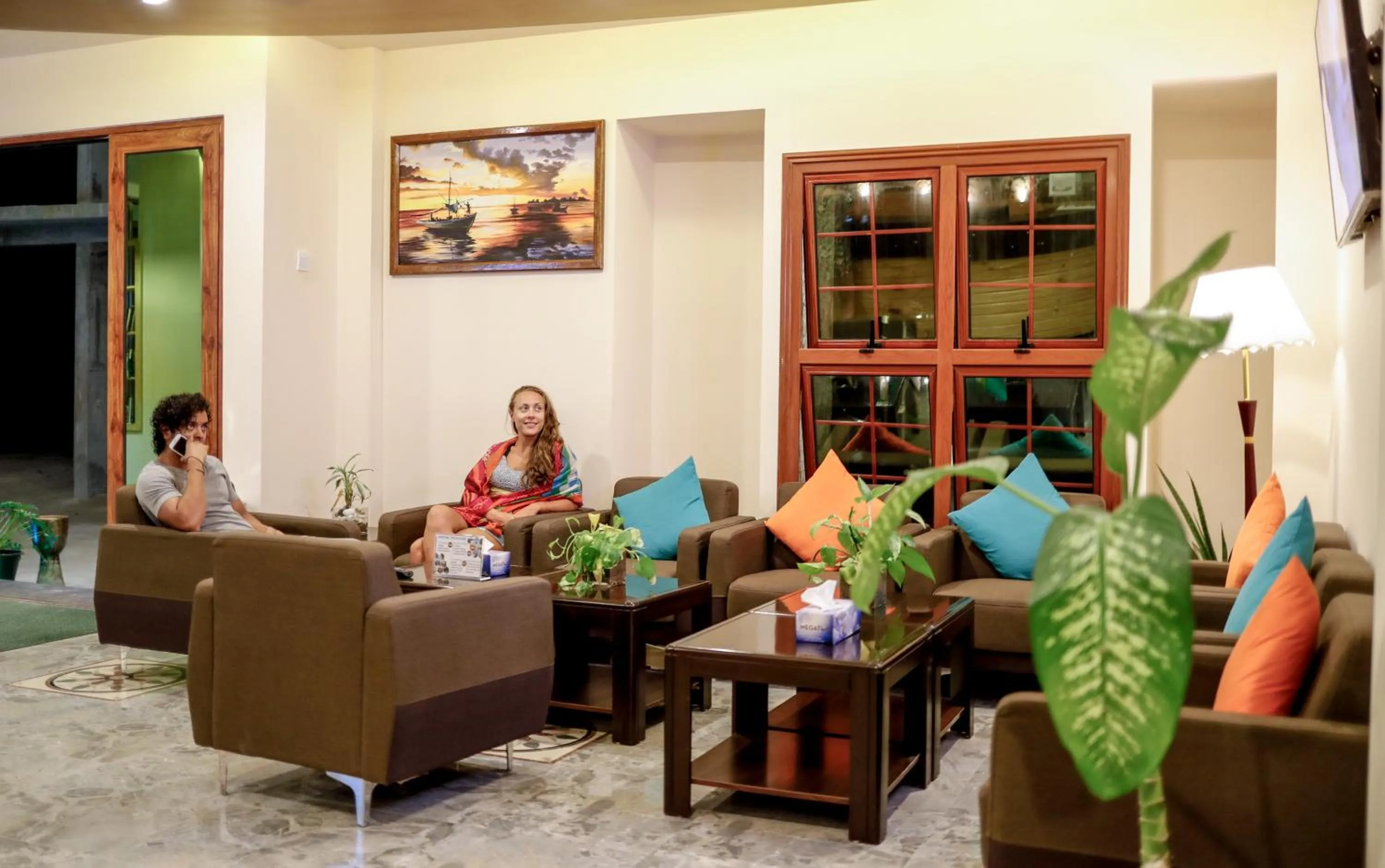 Communal lounge/ TV room in Triton Beach Hotel & Spa