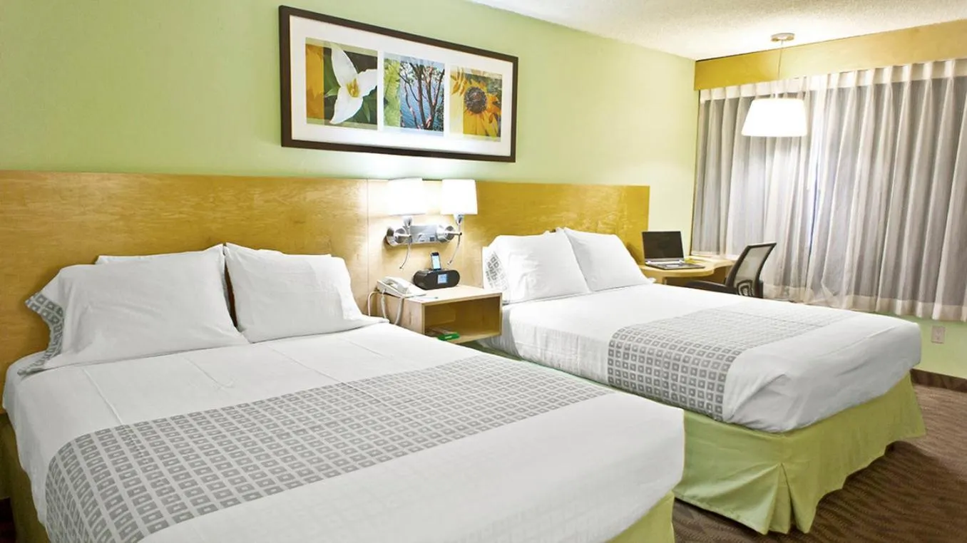 Bed in Hotel Nexus; BW Signature Collection