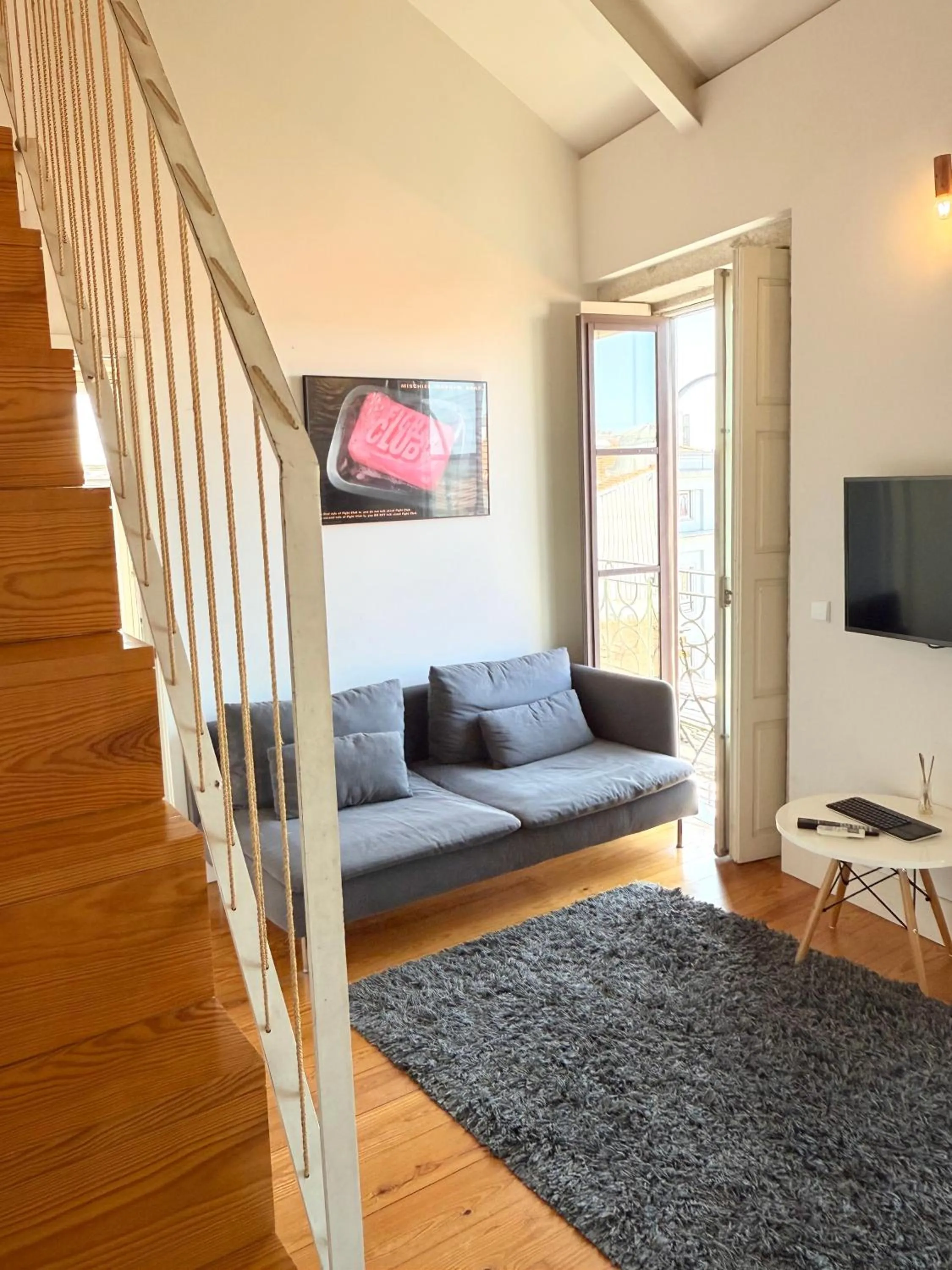 Communal lounge/ TV room in Porto Cinema Apartments