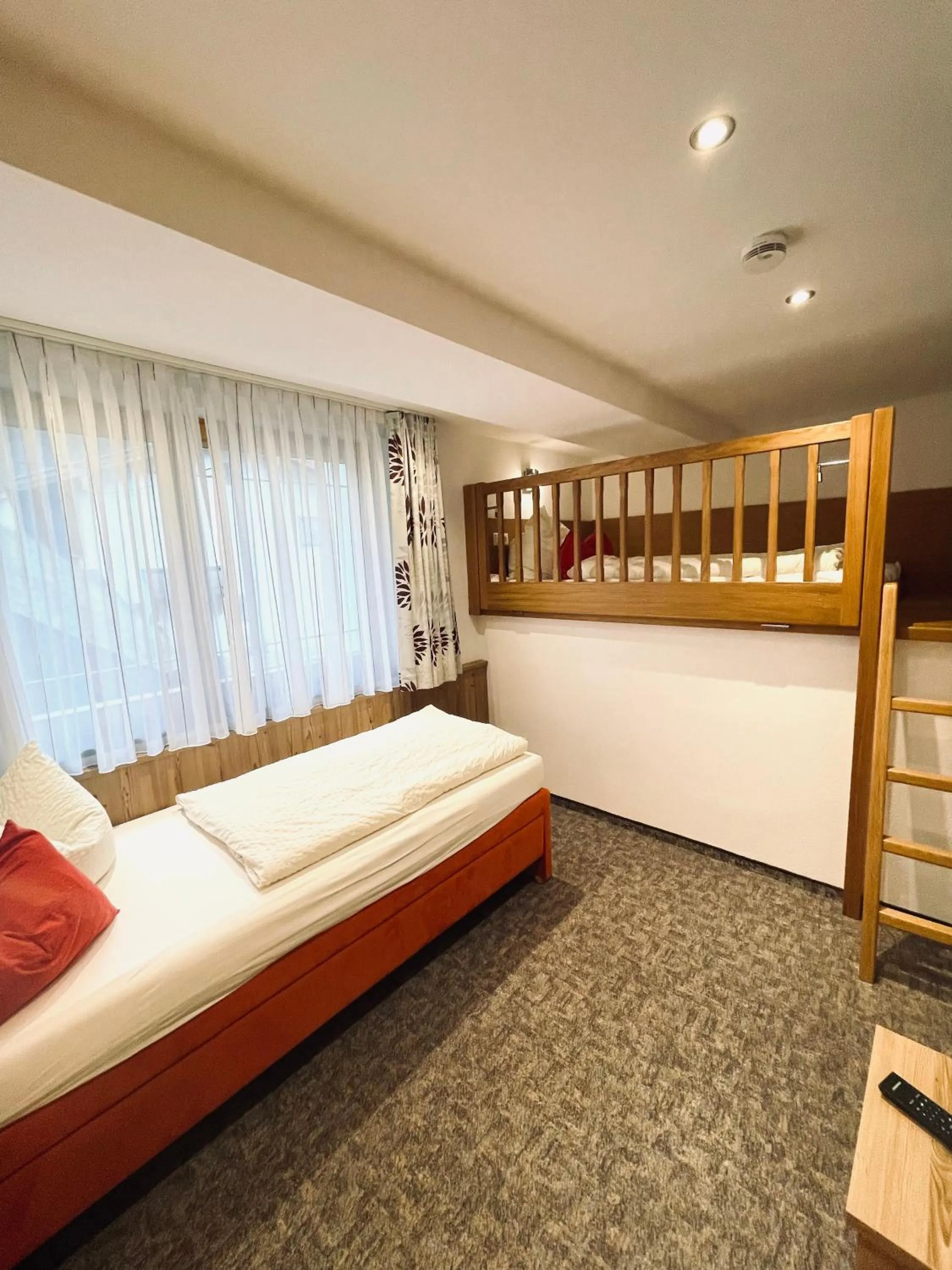 Photo of the whole room, Bed in Gästehaus Achental