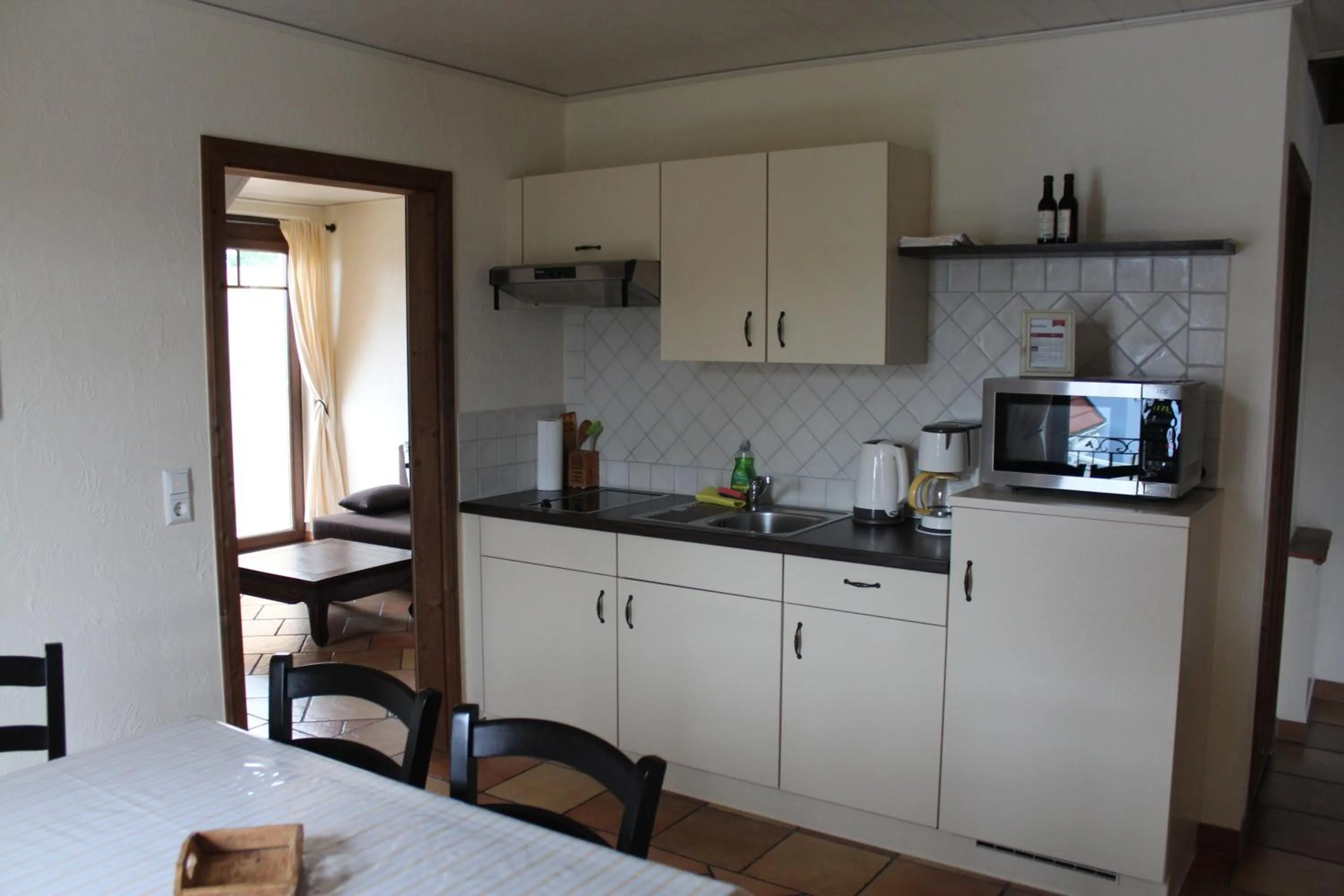 Dining area in Pension Vanii, Apartments