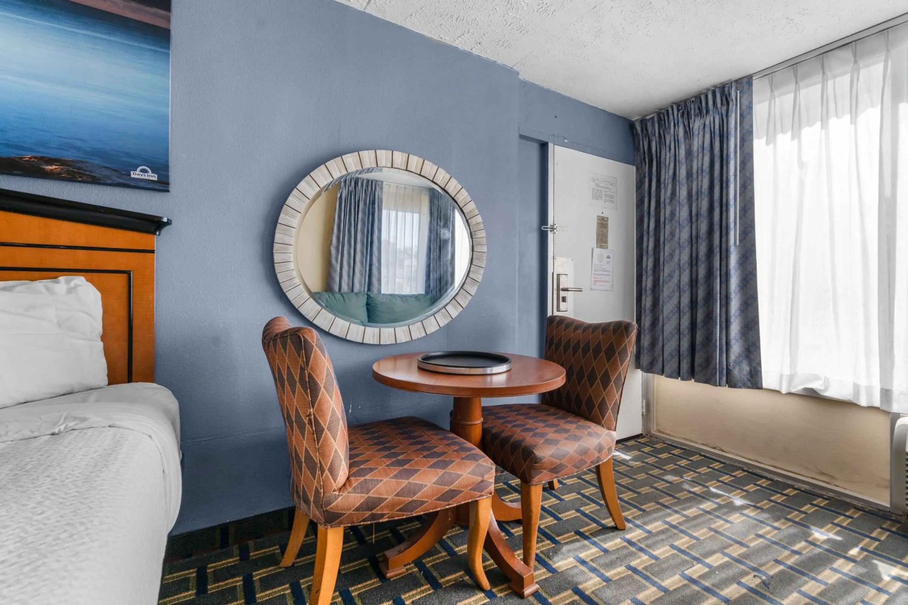 Living room, Seating Area in Days Inn by Wyndham Myrtle Beach-Grand Strand