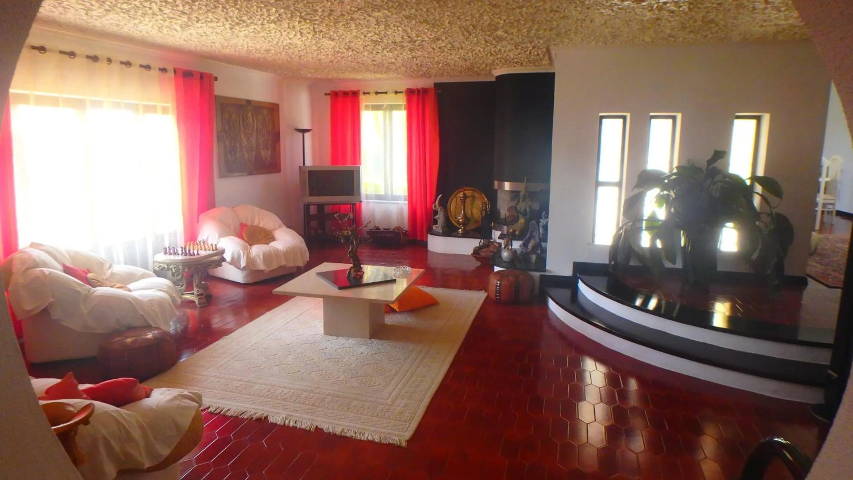 Communal lounge/ TV room in Casa Teresinha