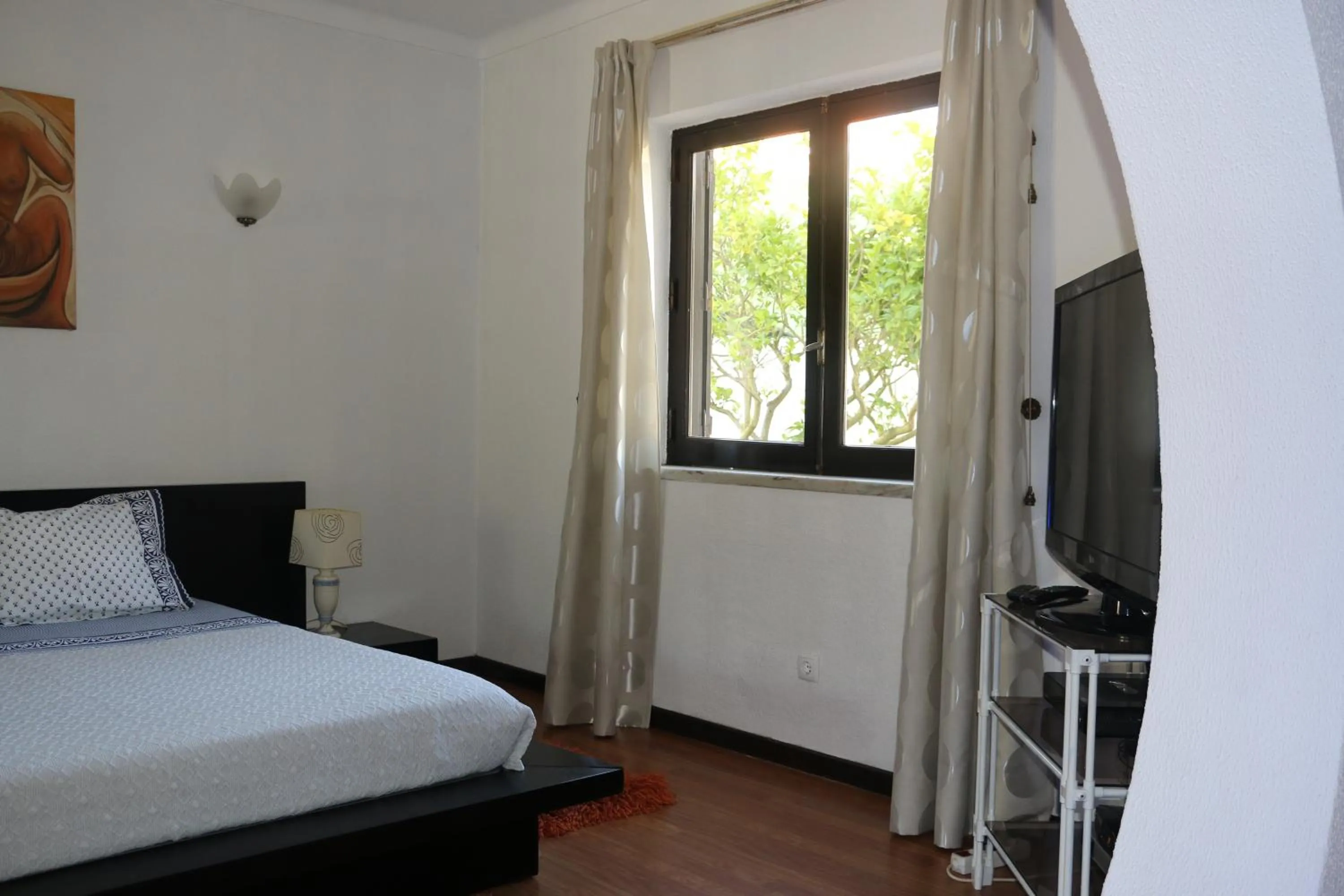 Garden view, Bed in Casa Teresinha