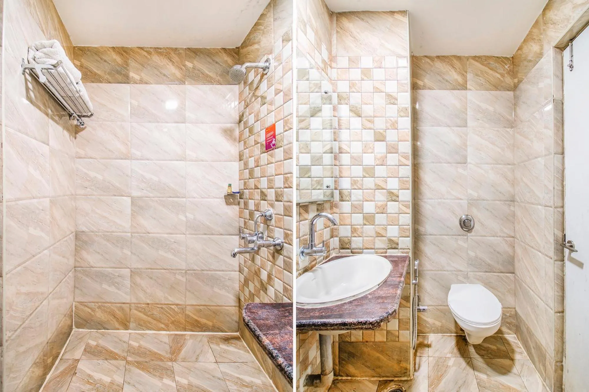 Bathroom in FabHotel Jansi Deluxe - Nr Gandhipuram Bus stand