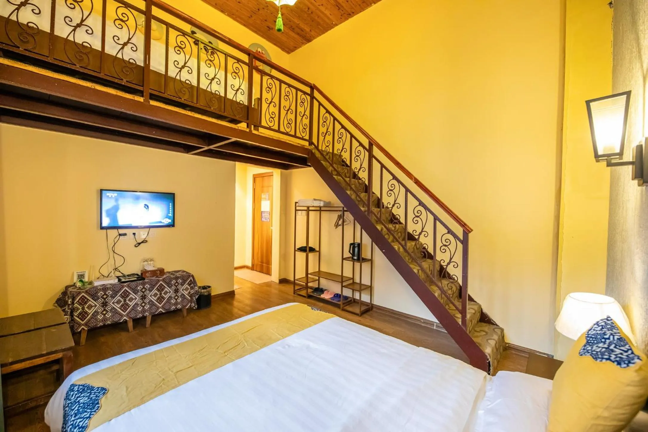 Bed in Secret Courtyard Resort Hotel