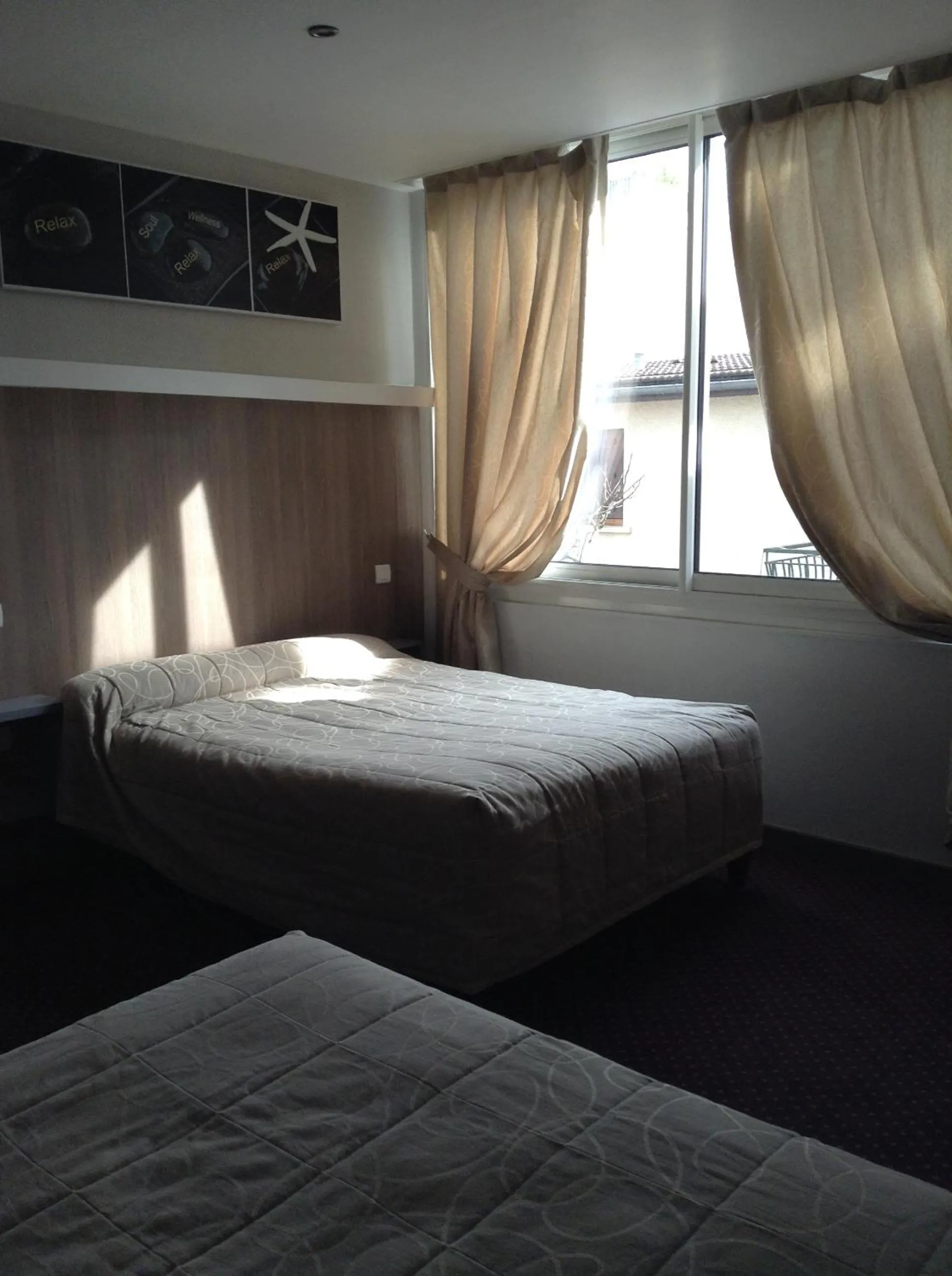 Photo of the whole room, Bed in Hôtel Du Stade
