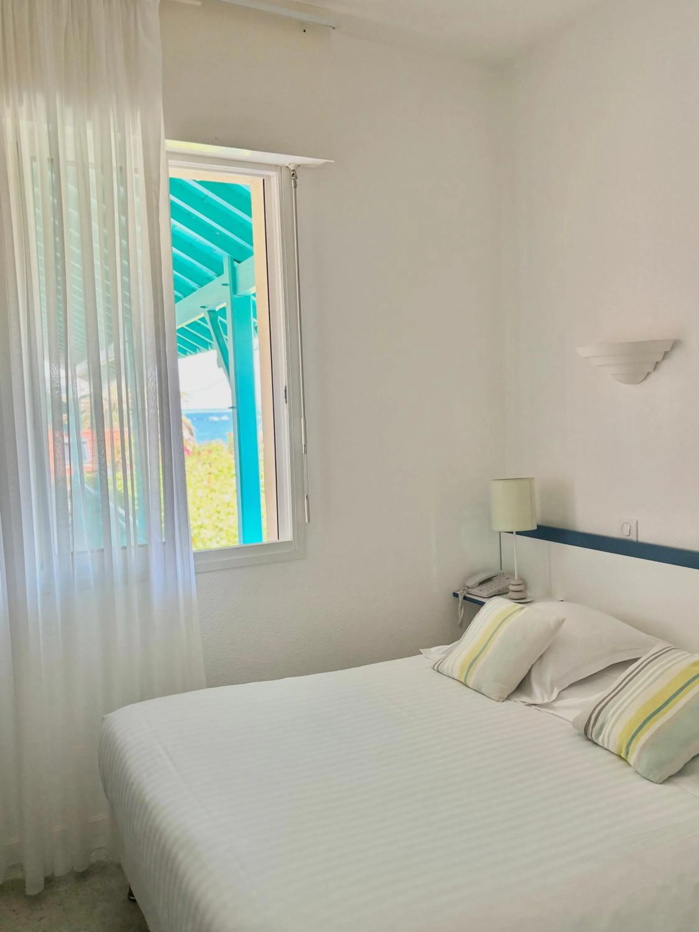 Bedroom, Bed in Hôtel Orange Marine