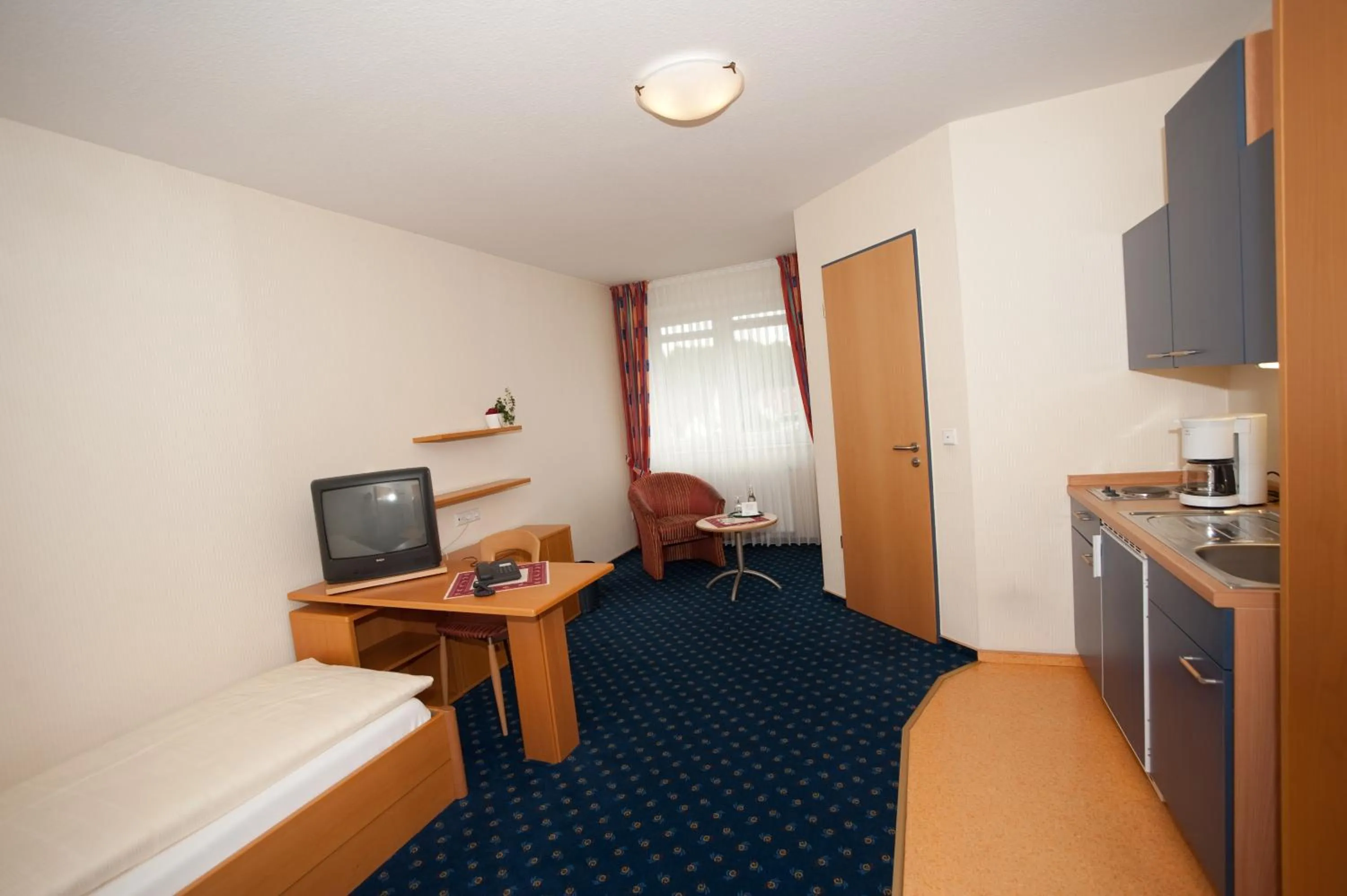 Kitchen or kitchenette in Akzent Hotel Hubertus