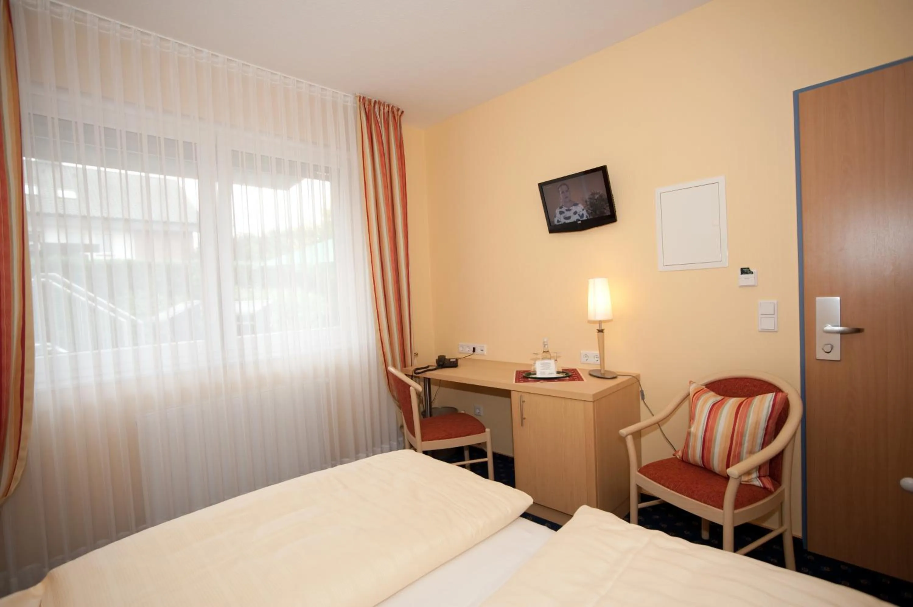 Bedroom in Akzent Hotel Hubertus