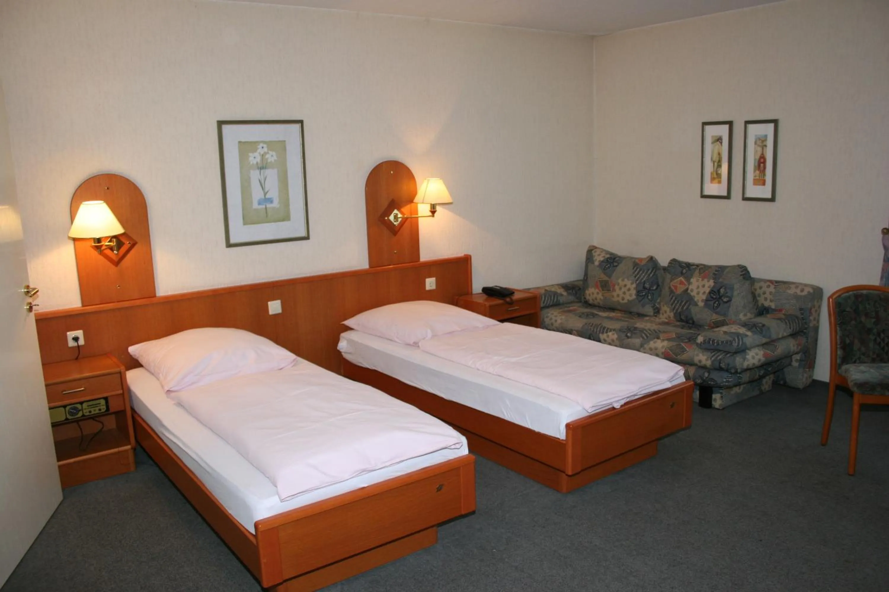 Bedroom in Akzent Hotel Hubertus