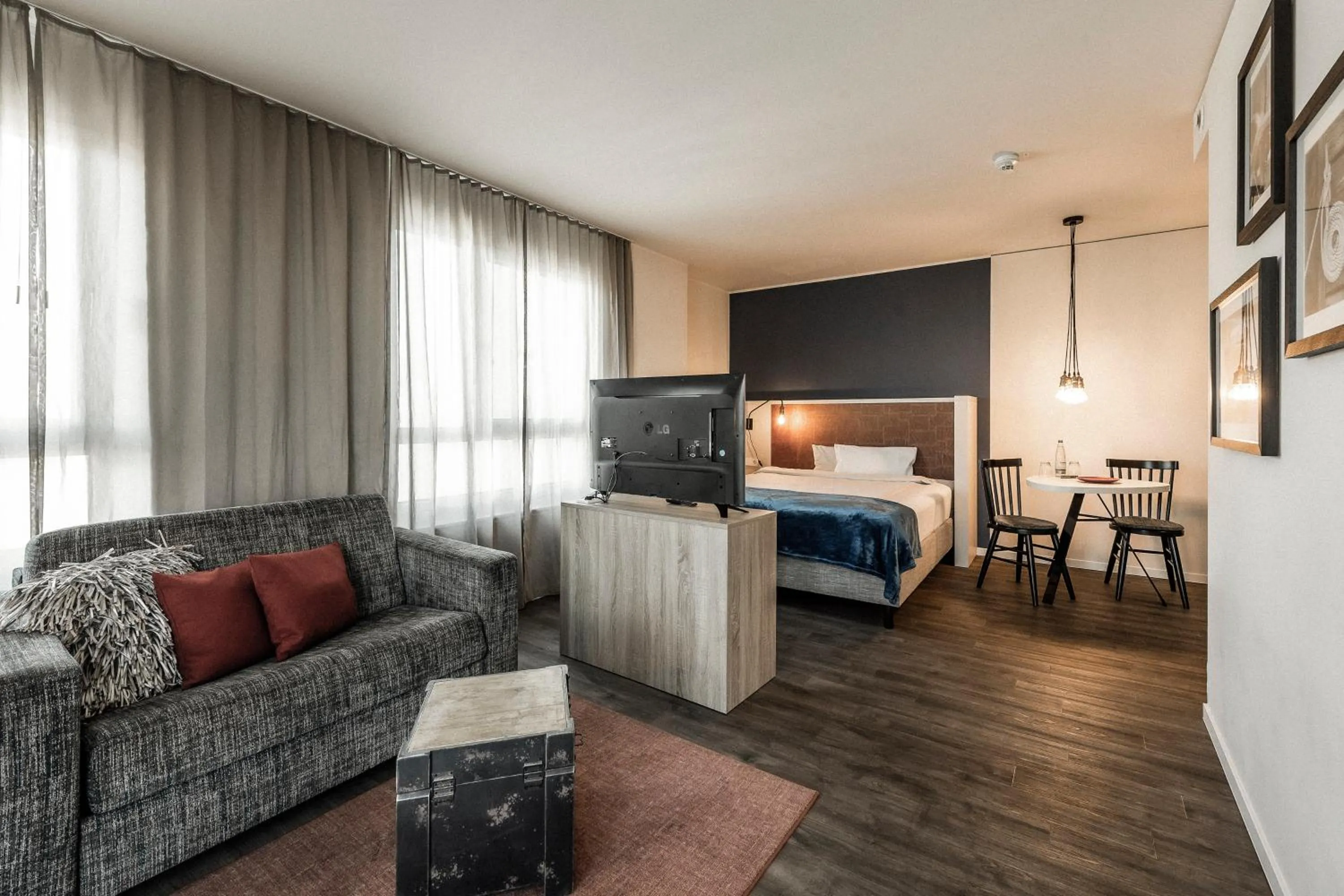 Living room, Bed in HARBR. boardinghouse Ludwigsburg