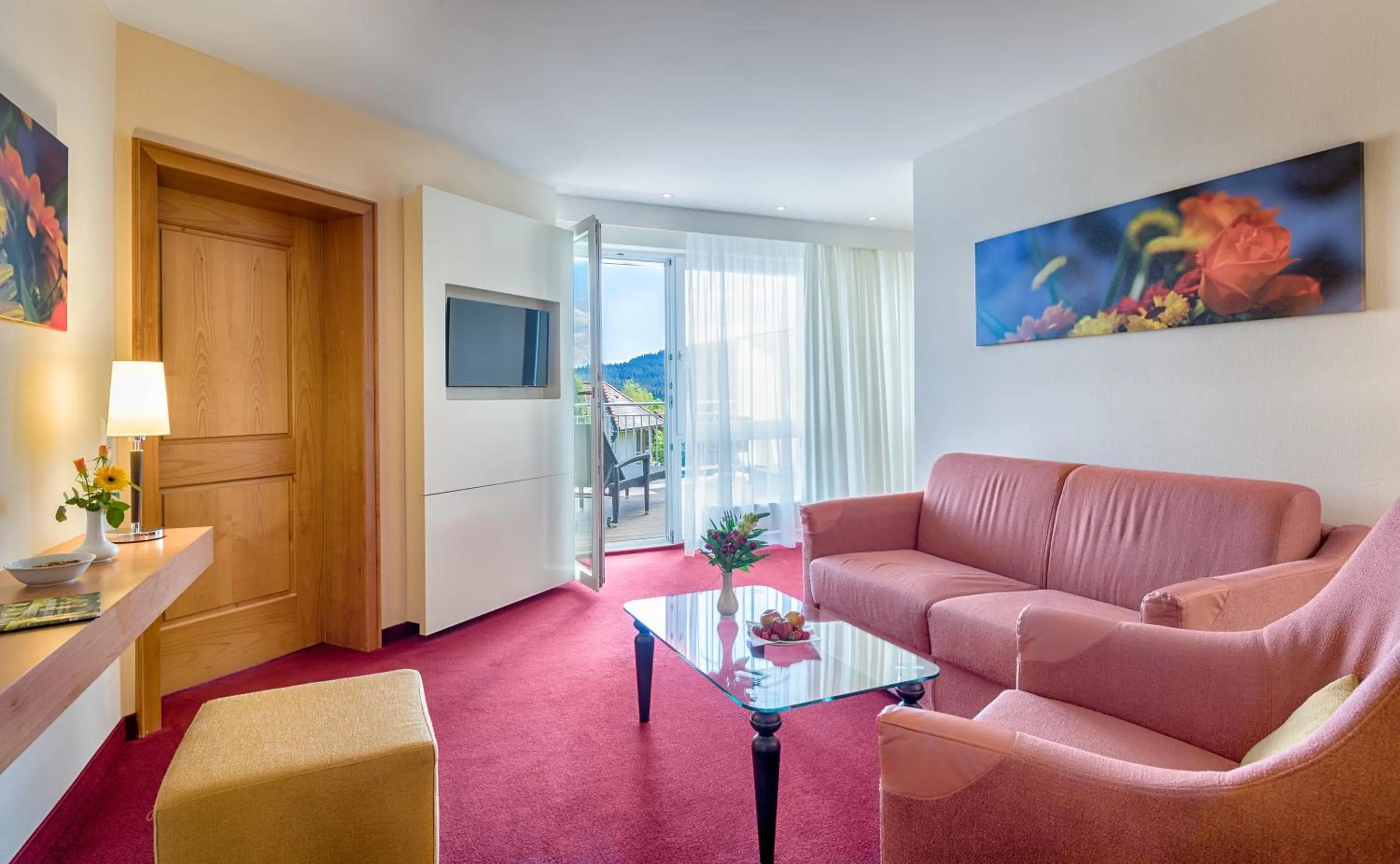 Communal lounge/ TV room in Parkhotel Flora am Schluchsee