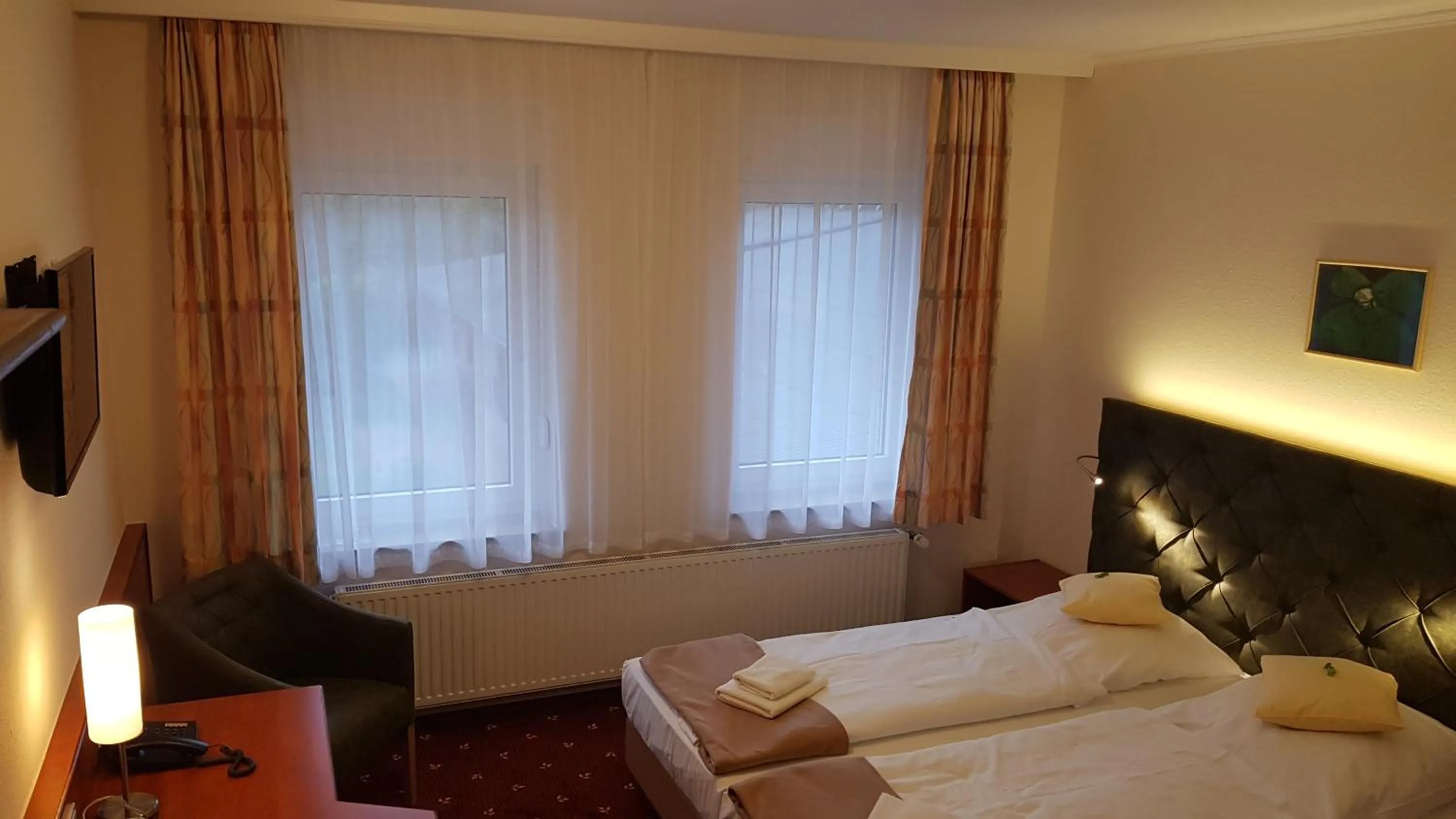 Photo of the whole room, Bed in Kräuterhotel & Restaurant Heidejäger