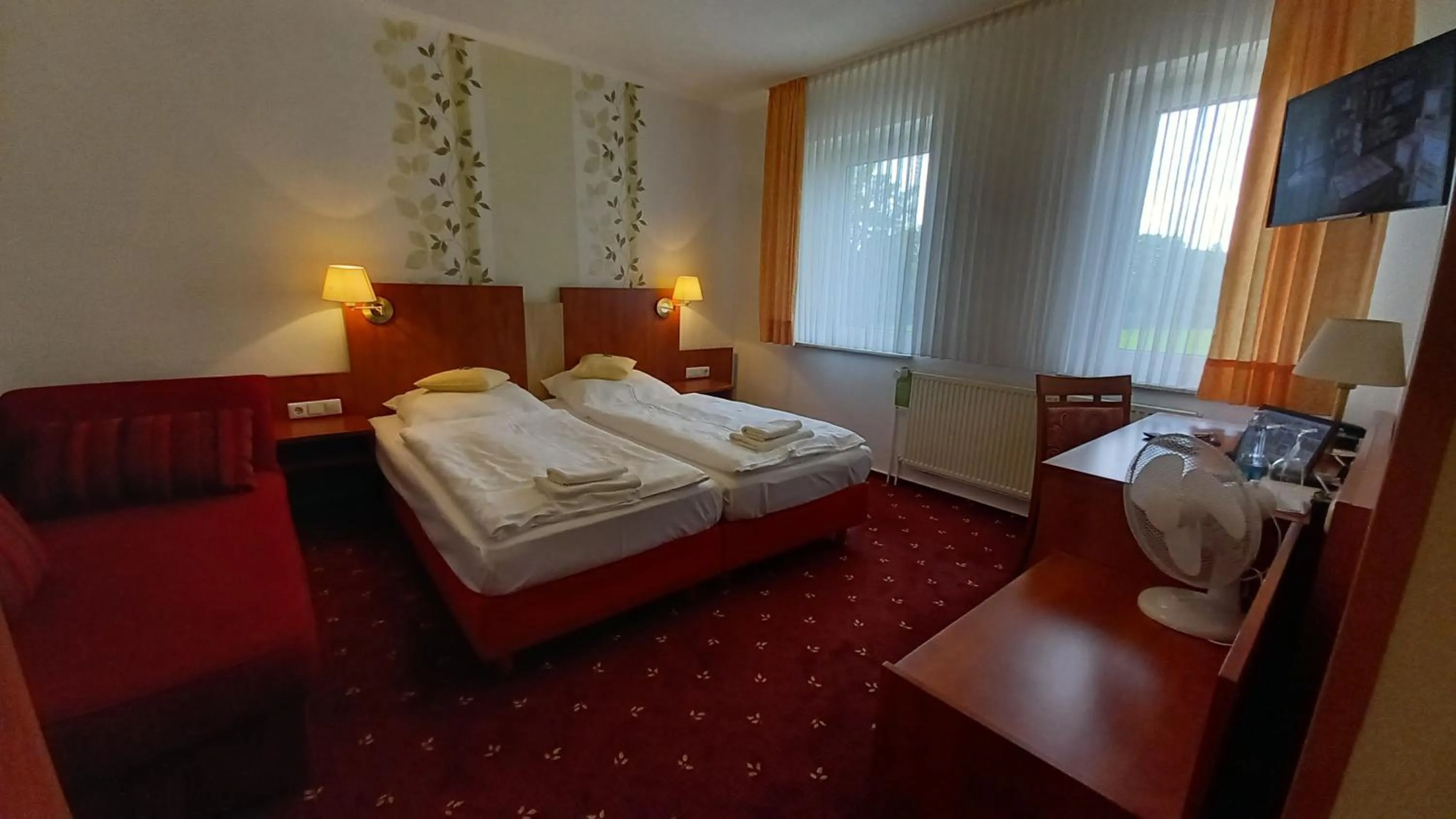 Photo of the whole room, Bed in Kräuterhotel & Restaurant Heidejäger