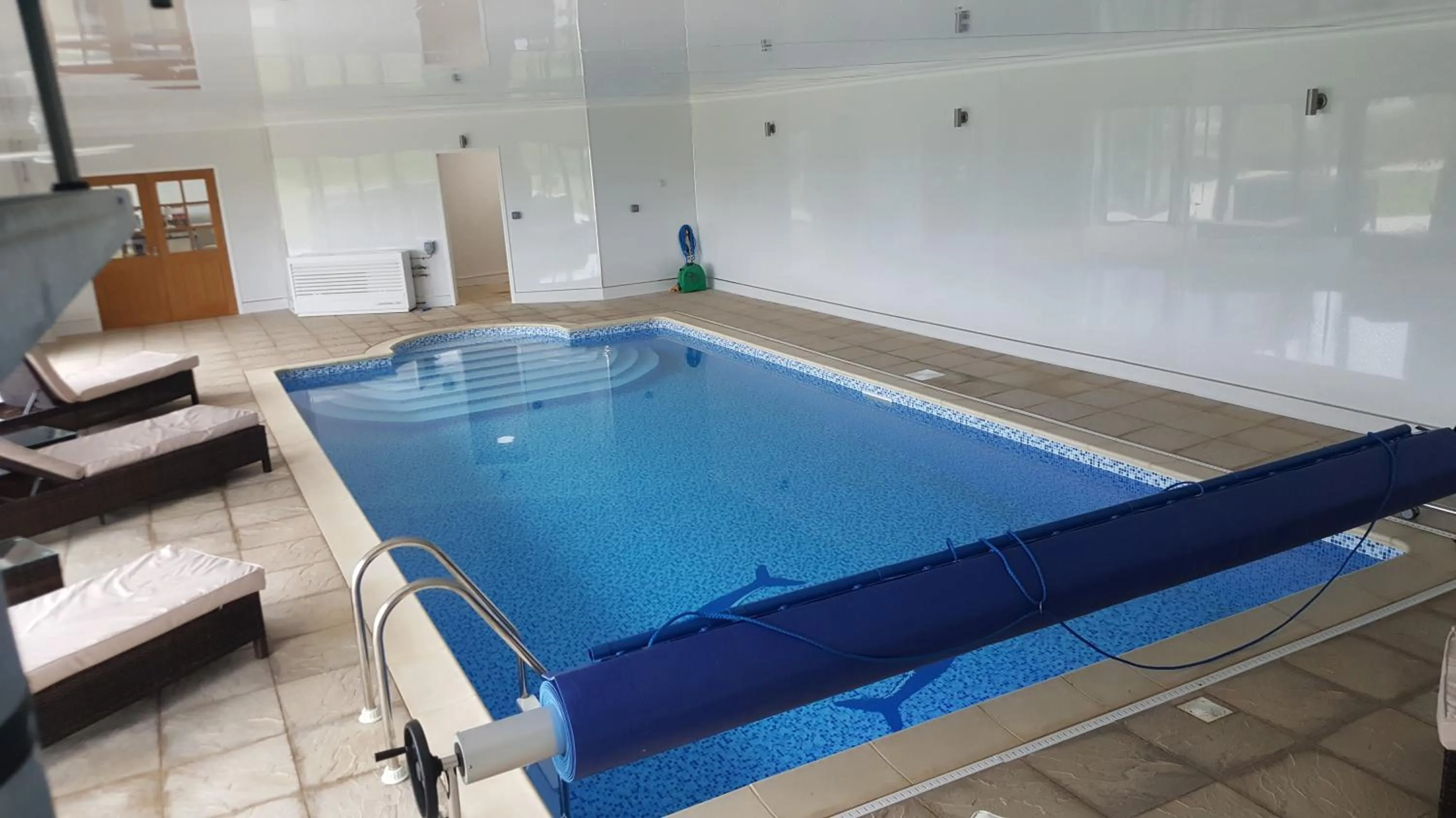 Swimming pool in Woodhouse Farm Lodge