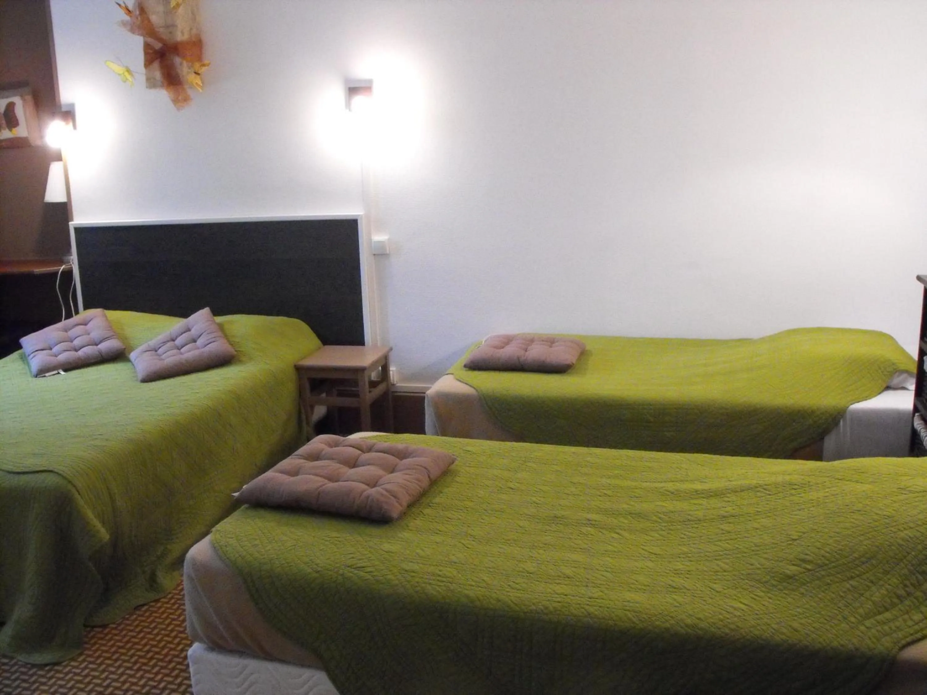 Photo of the whole room, Bed in Logis Hôtel Restaurant Les Capucins