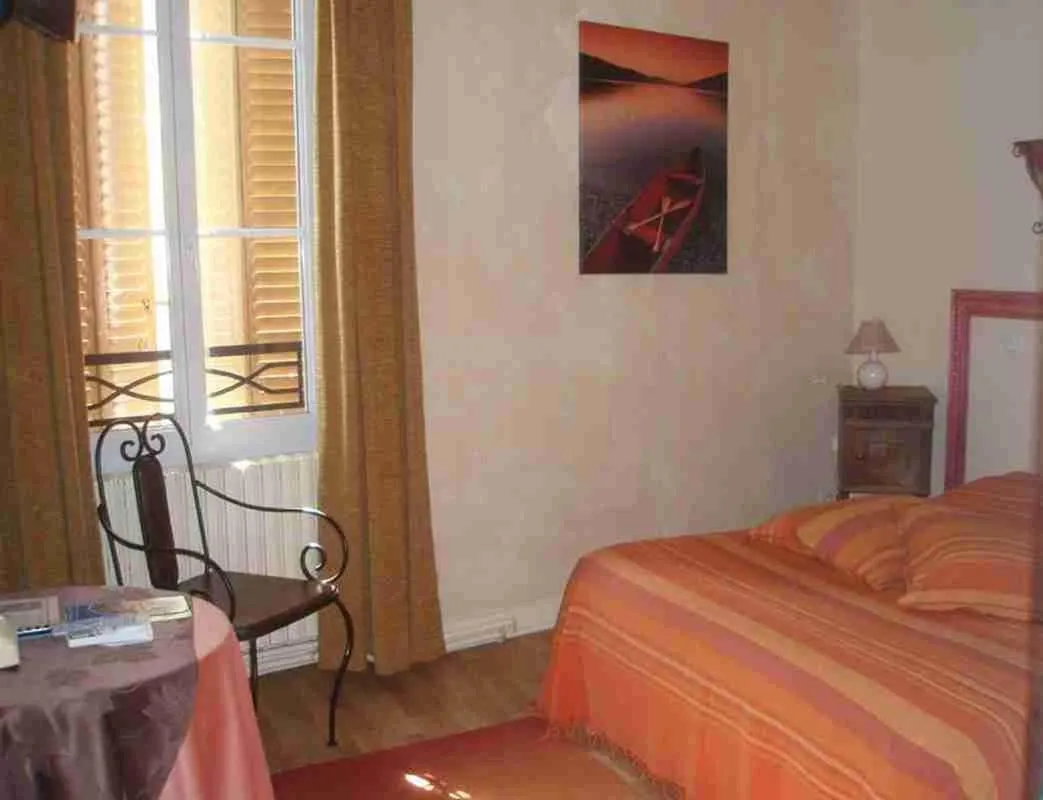 Photo of the whole room, Bed in Logis Hôtel Restaurant Les Capucins