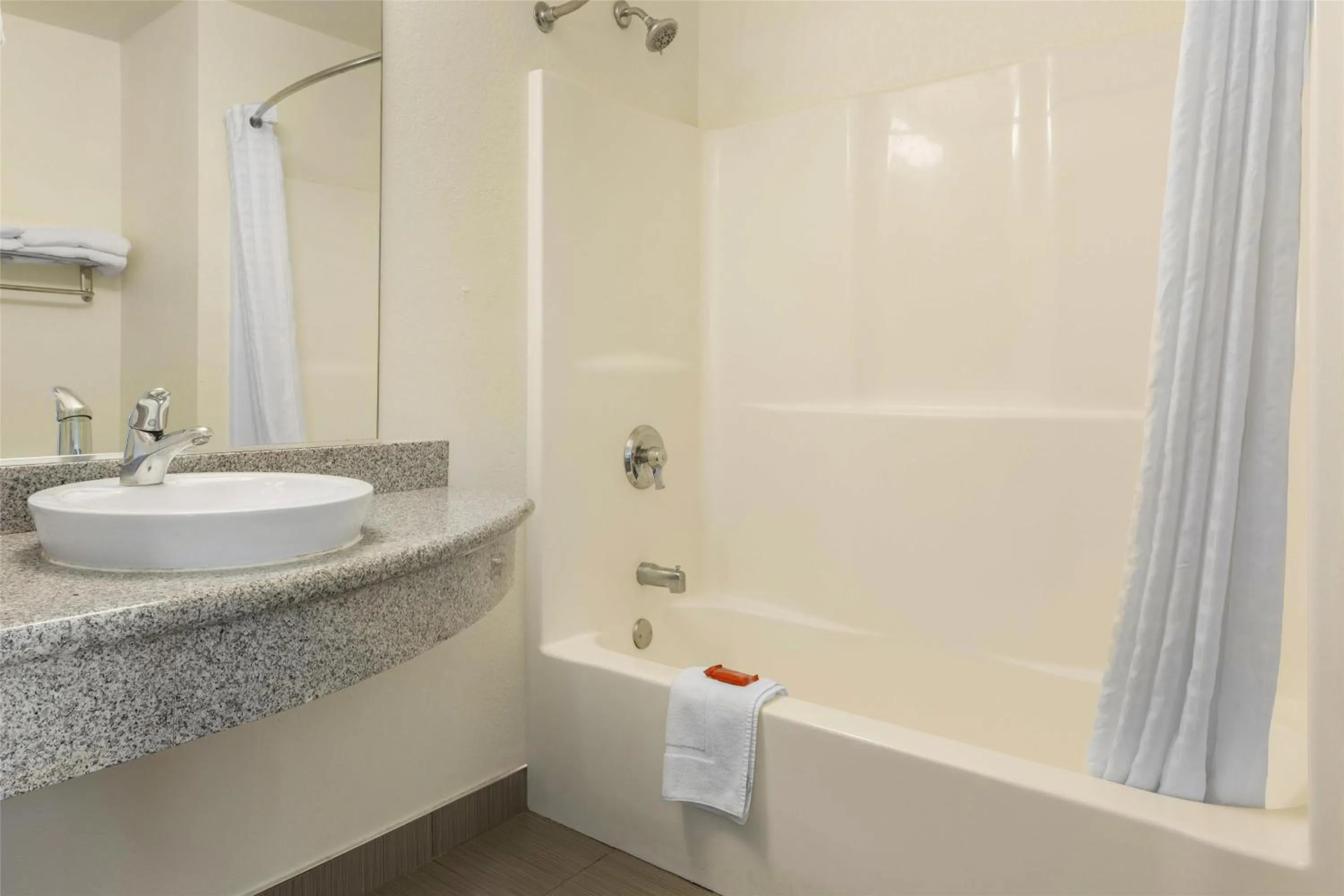 Bathroom in SureStay Plus Hotel by Best Western Niagara Falls East