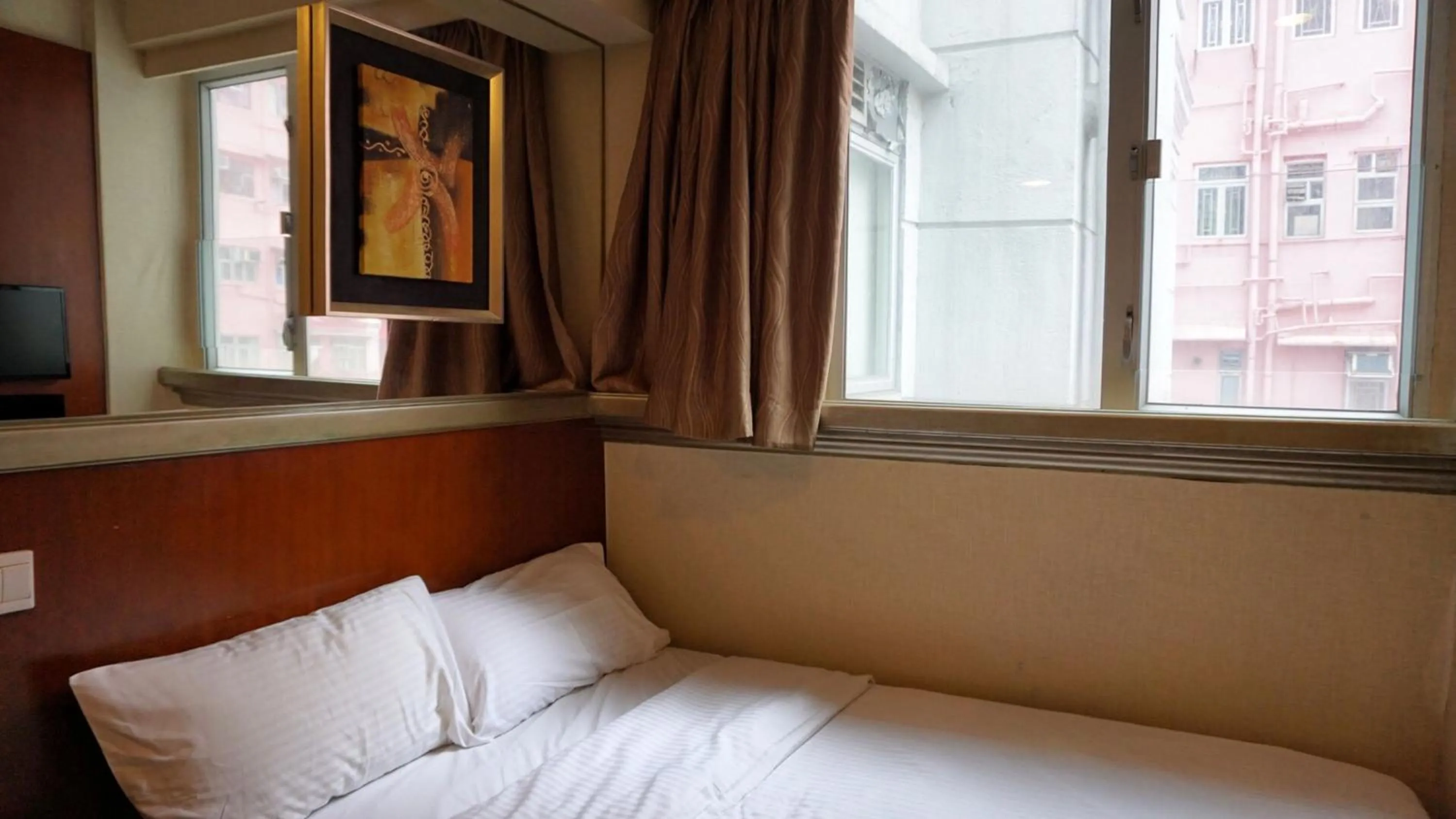 Bed in Oriental Lander Hotel