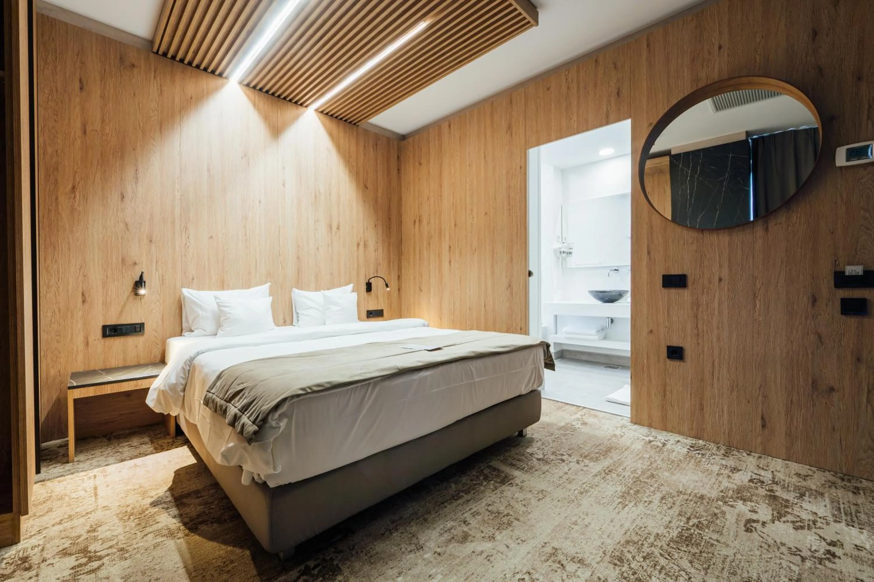 Bed in Fabesca Boutique Hotel & SPA