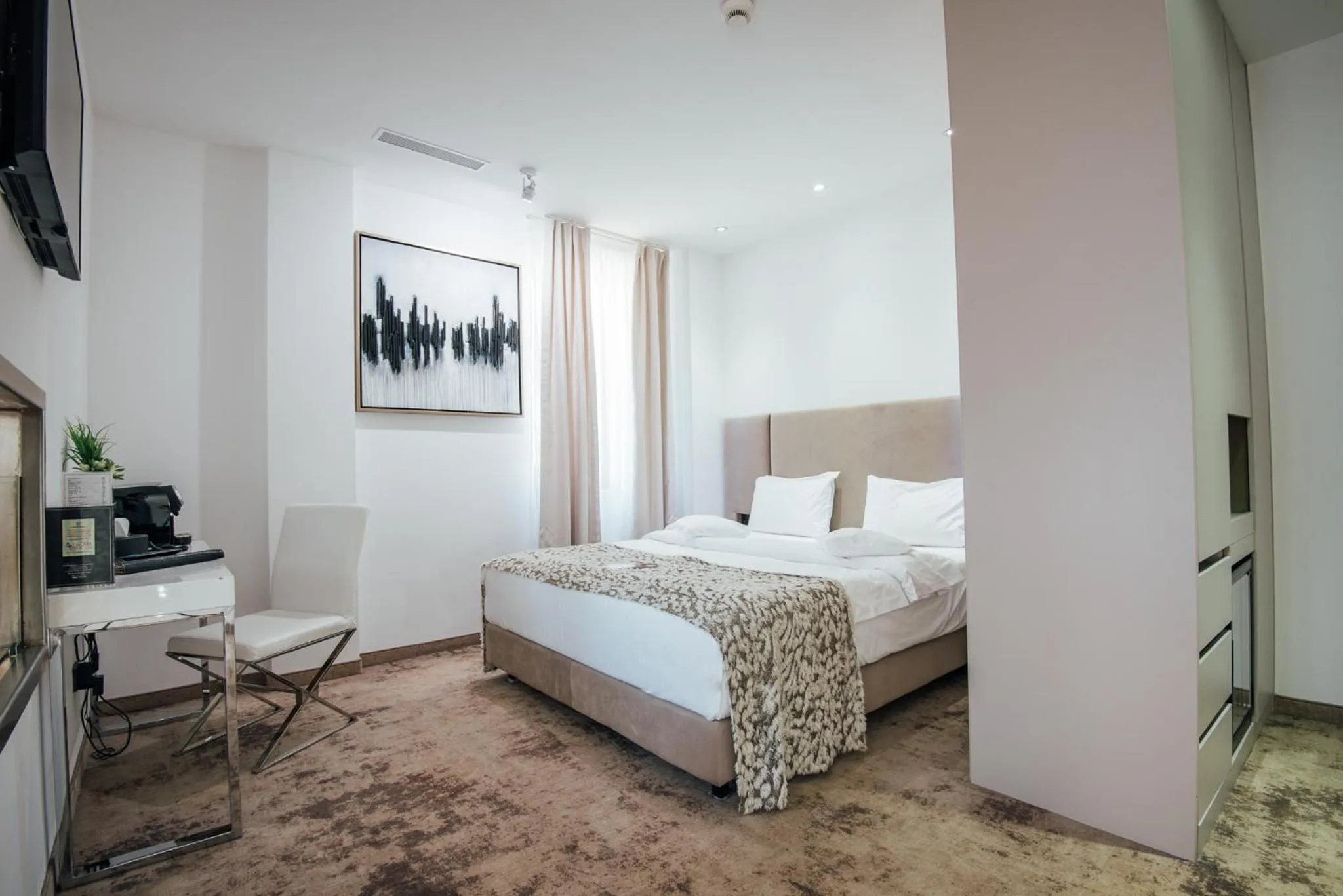 Bed in Fabesca Boutique Hotel & SPA