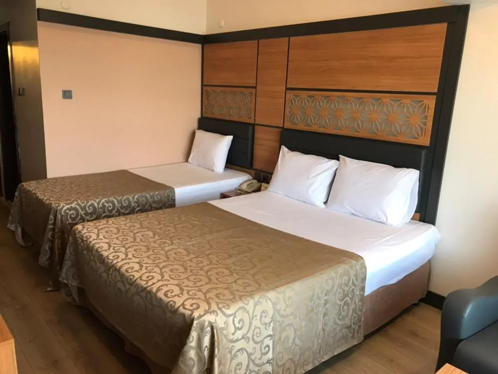 Bed in Ulasan Hotel Caravan Camping