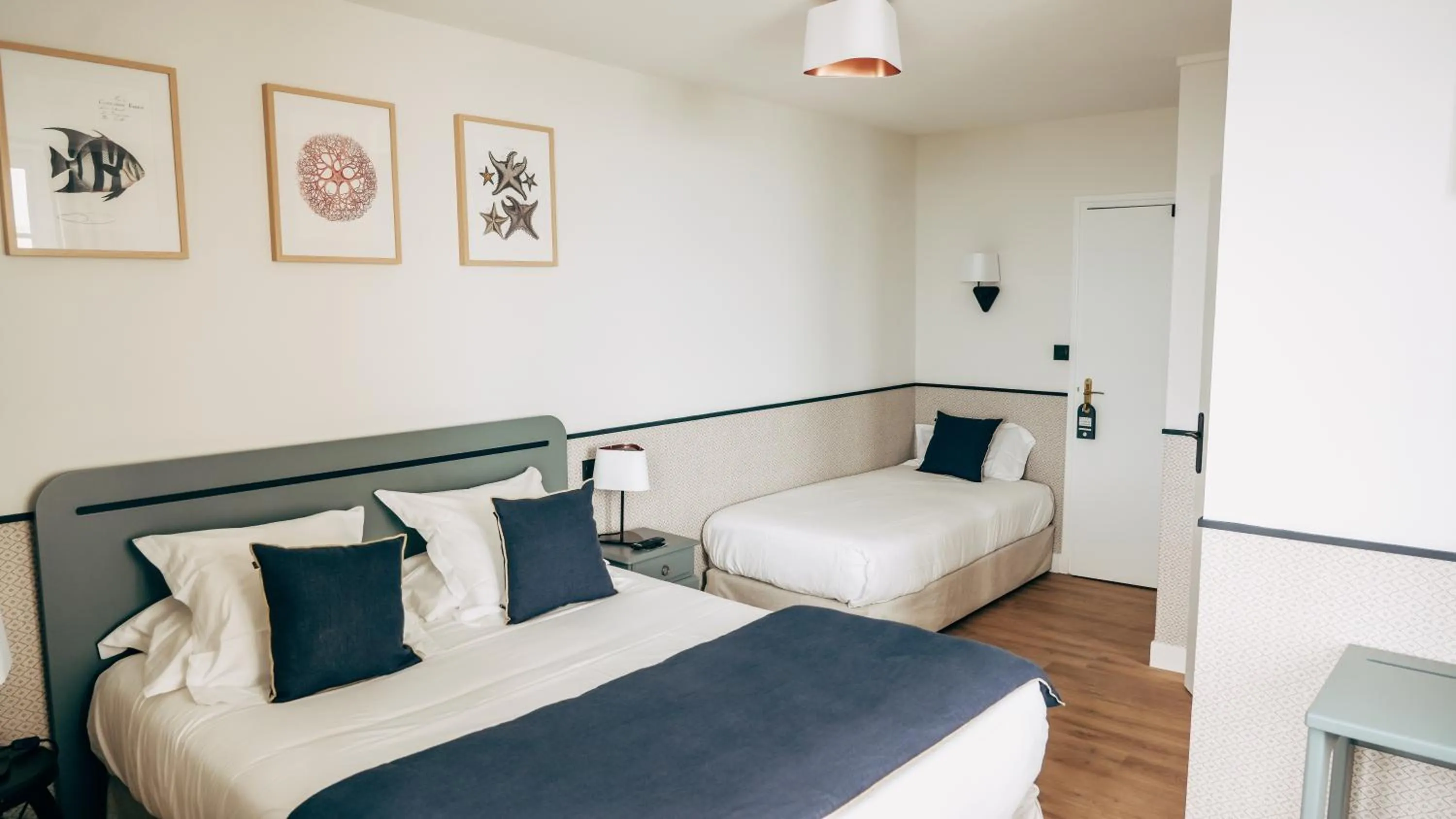 Bed in Hôtel De La Marine