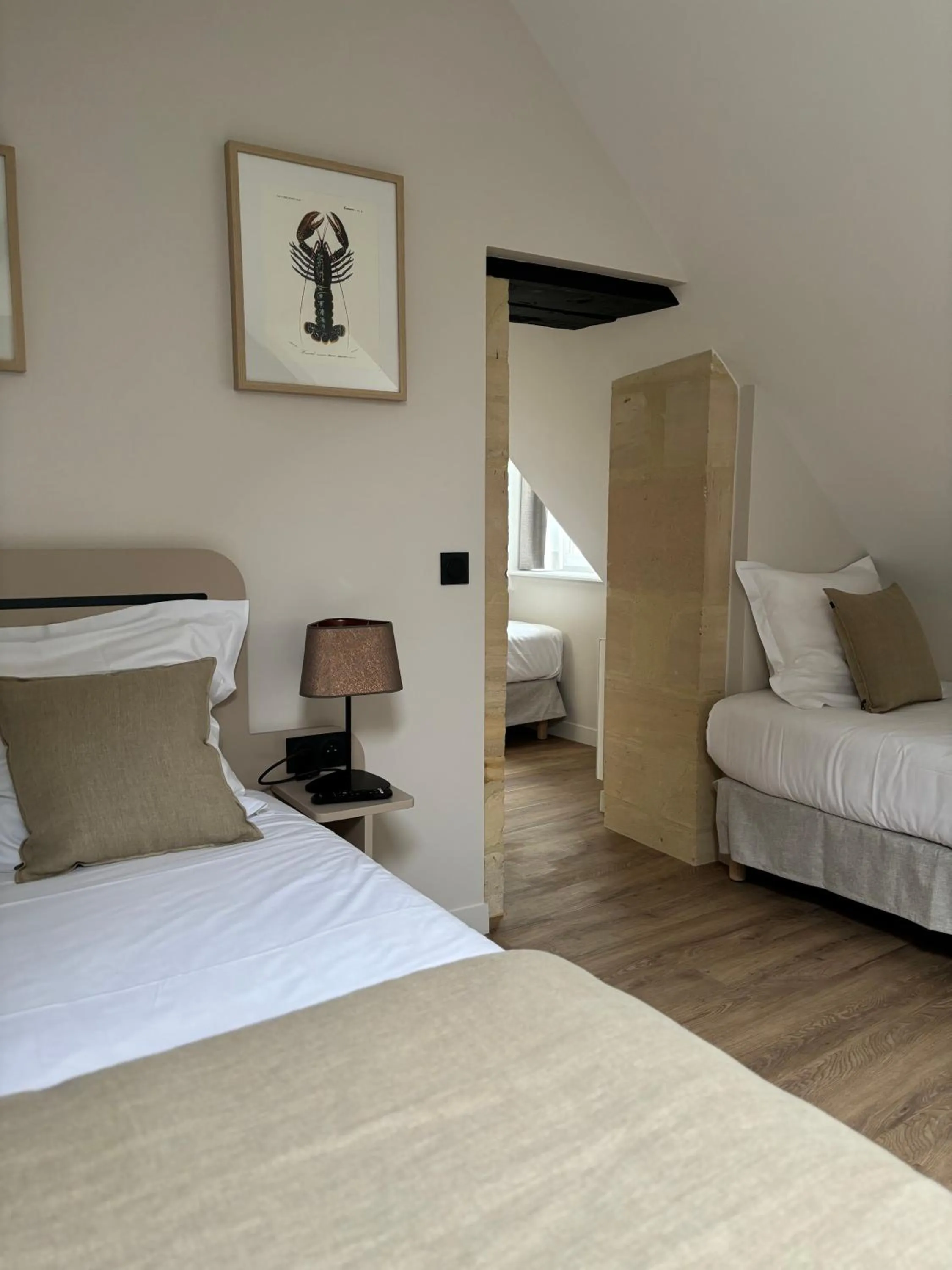 Bed in Hôtel De La Marine