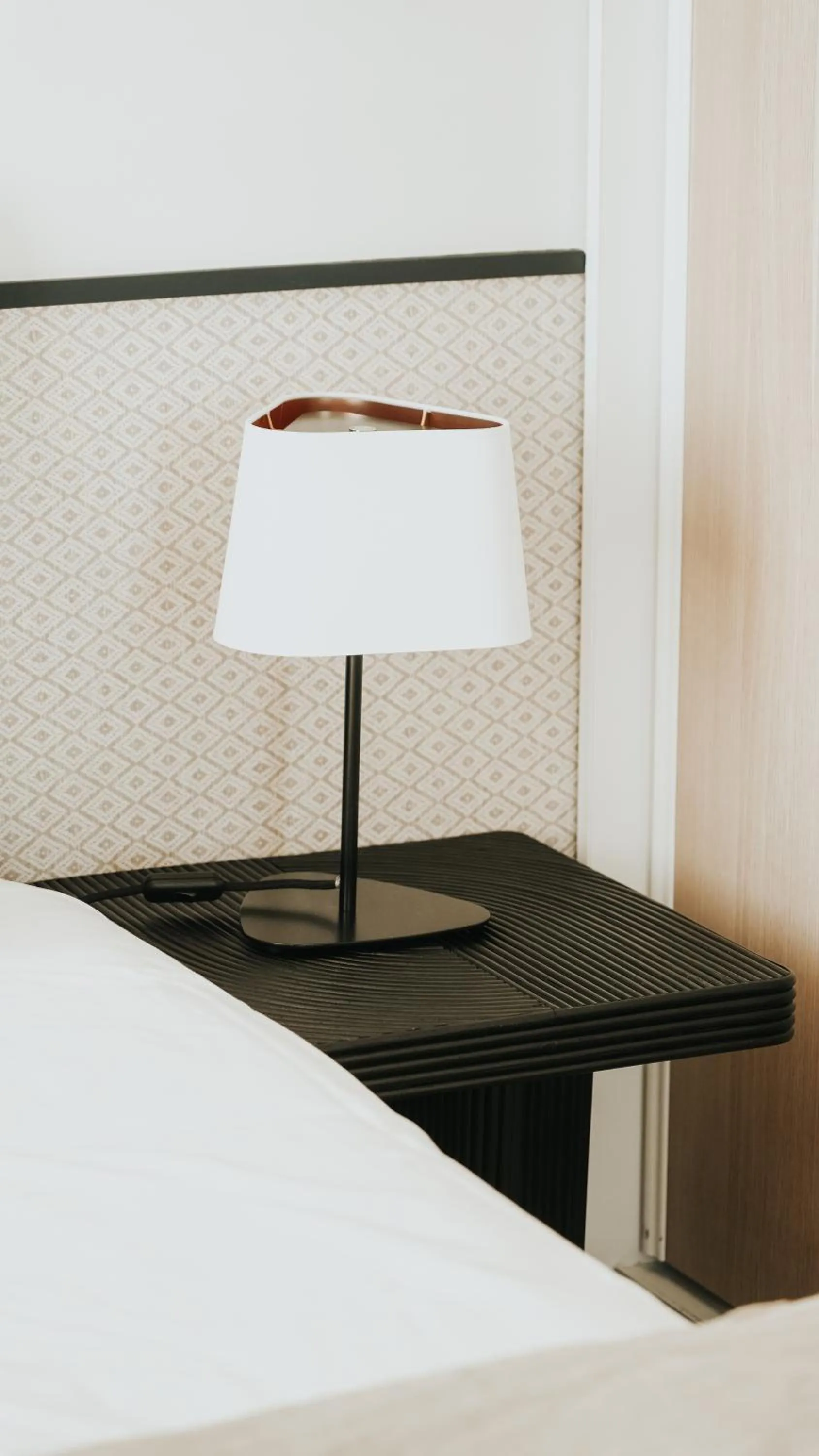 Bed in Hôtel De La Marine