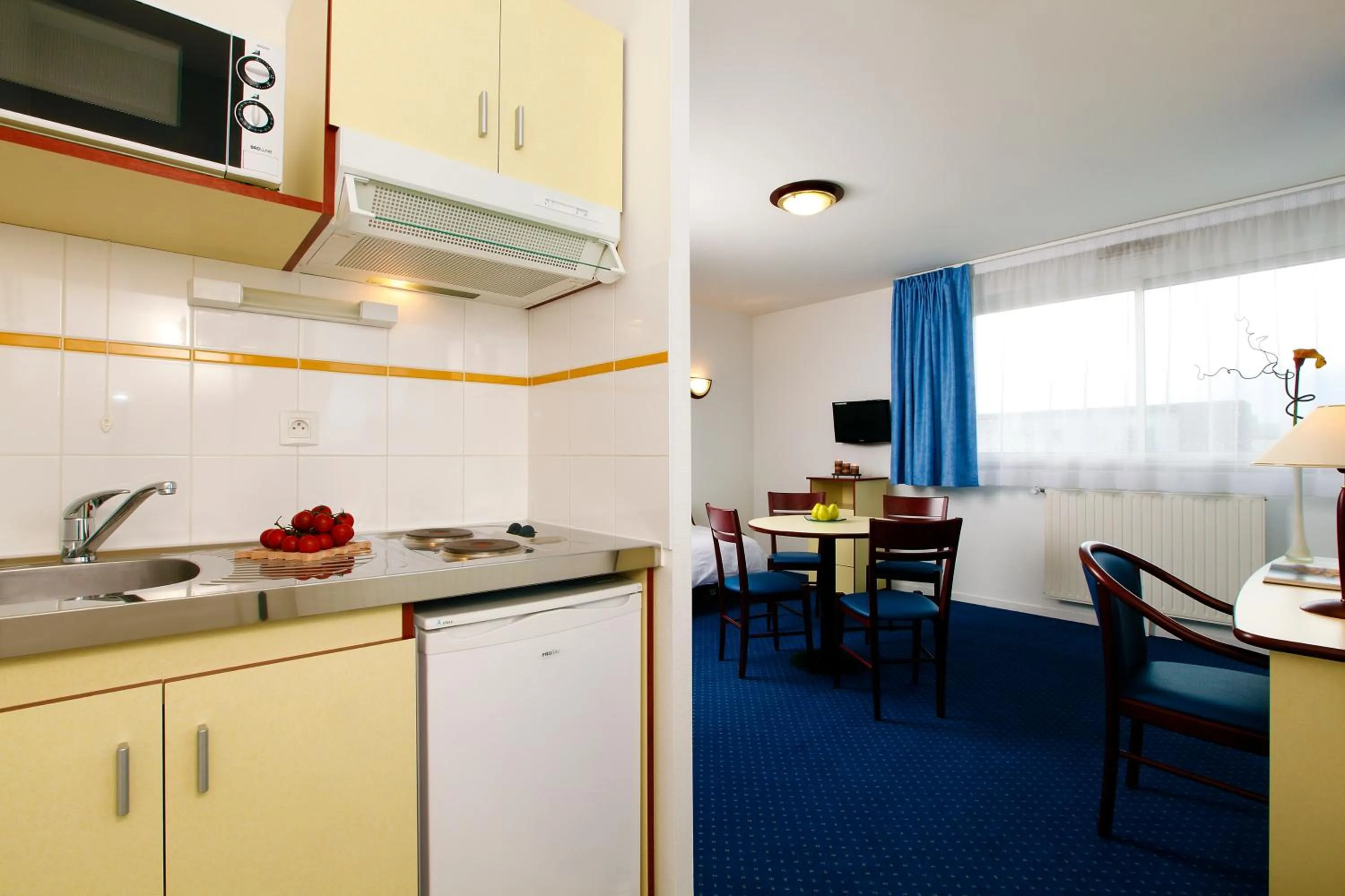 Kitchen or kitchenette in Appart'City Classic Rennes Beauregard