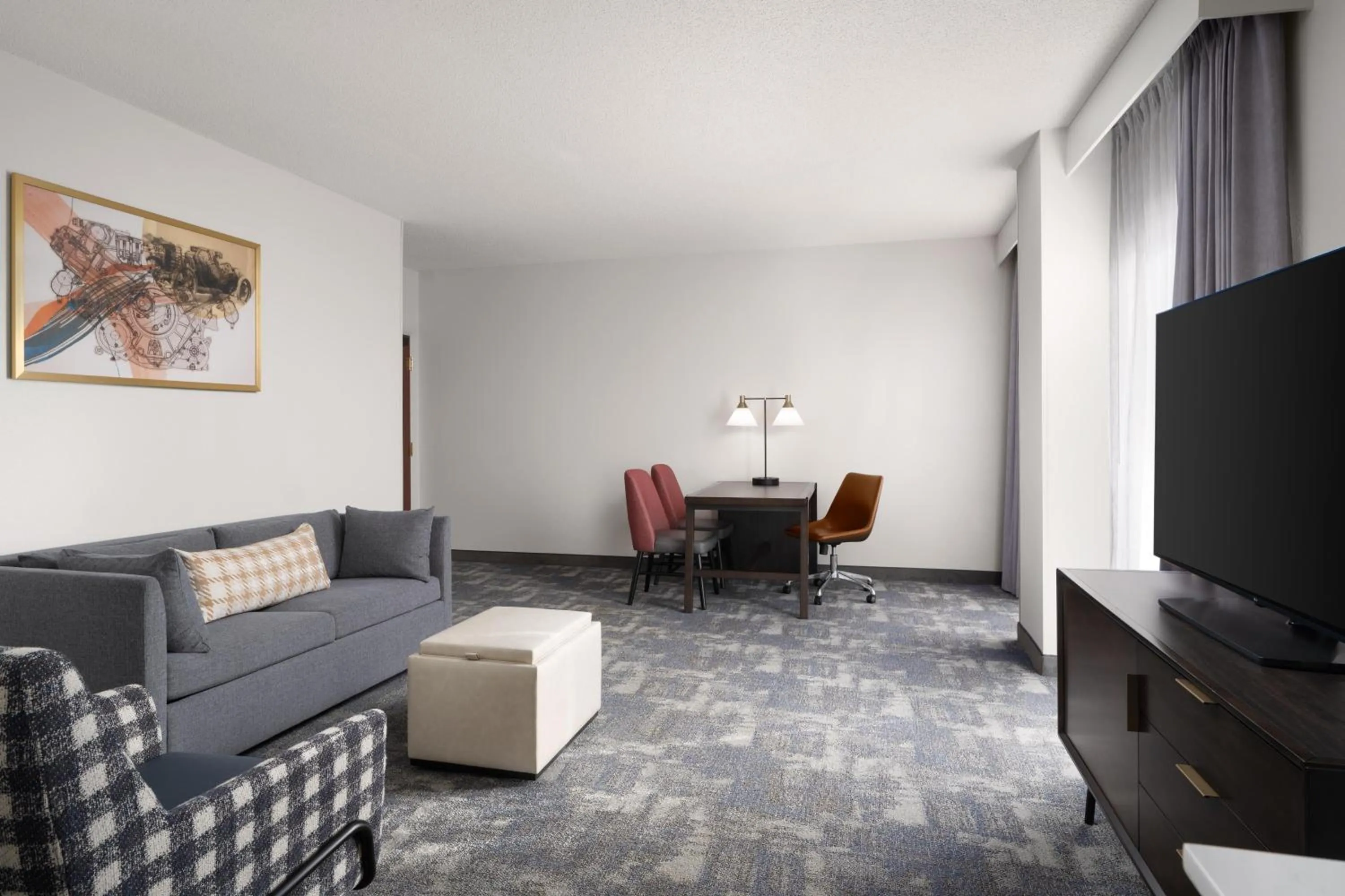 Living room in Embassy Suites by Hilton Charlotte Concord Golf Resort & Spa