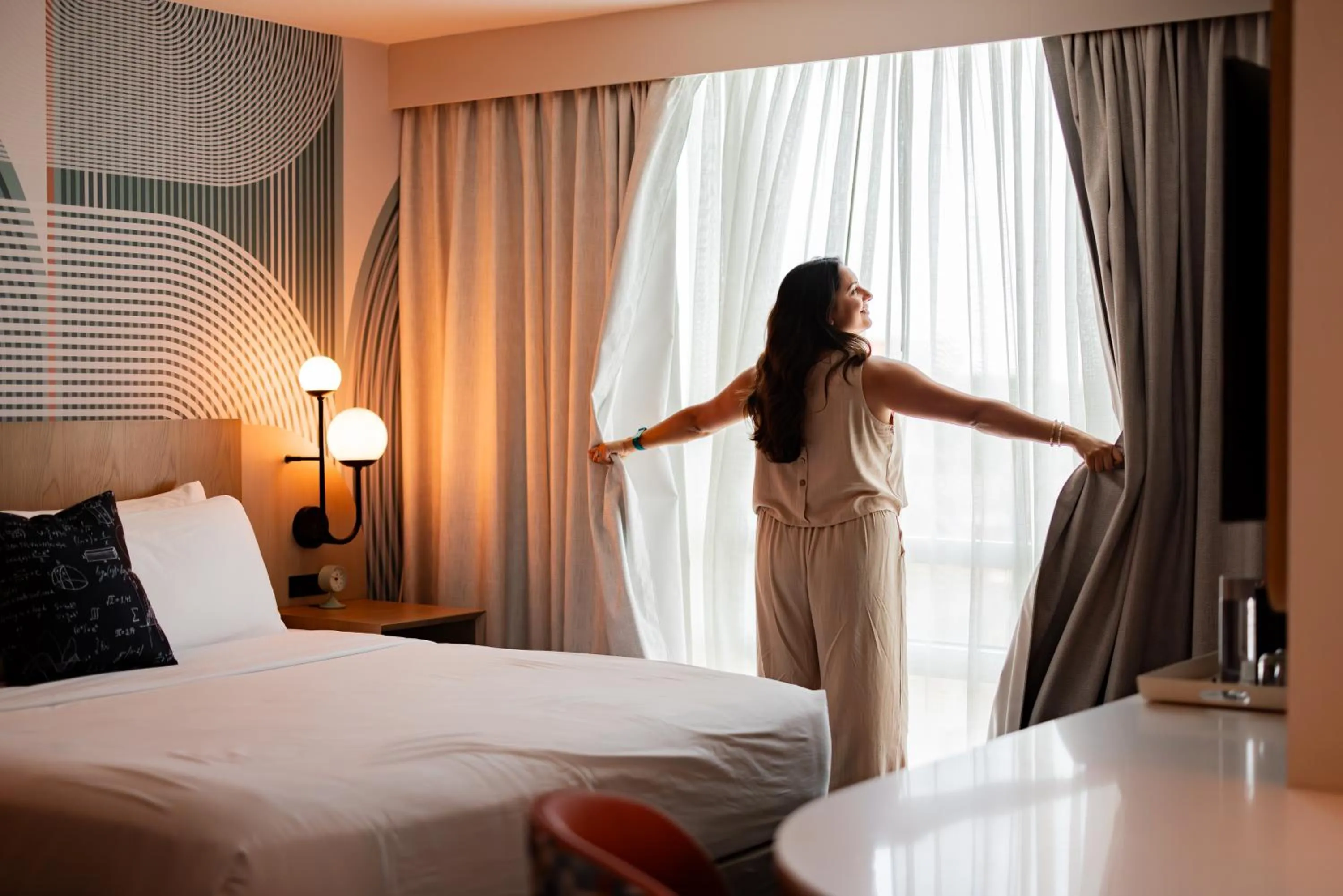 View (from property/room), Bed in Hotel Landy Orlando Universal Blvd, a Tribute Portfolio Hotel