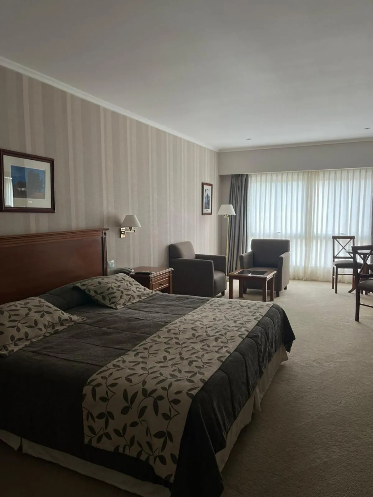 Bed in Howard Johnson Rio Ceballos Hotel y Casino