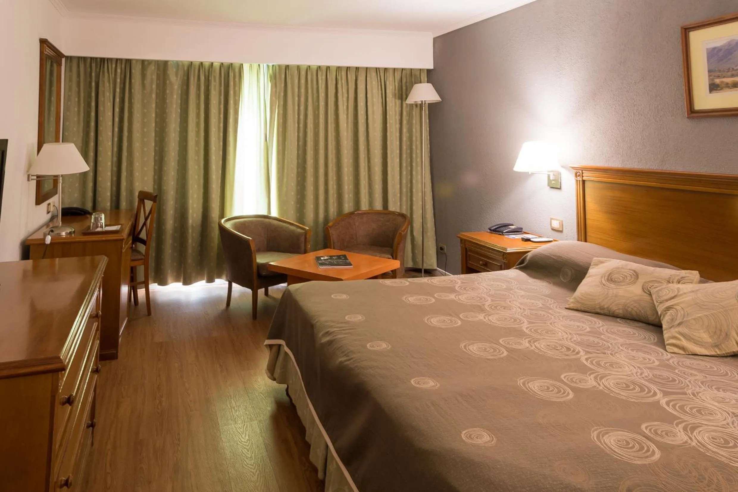 Bed in Howard Johnson Rio Cuarto Hotel y Casino