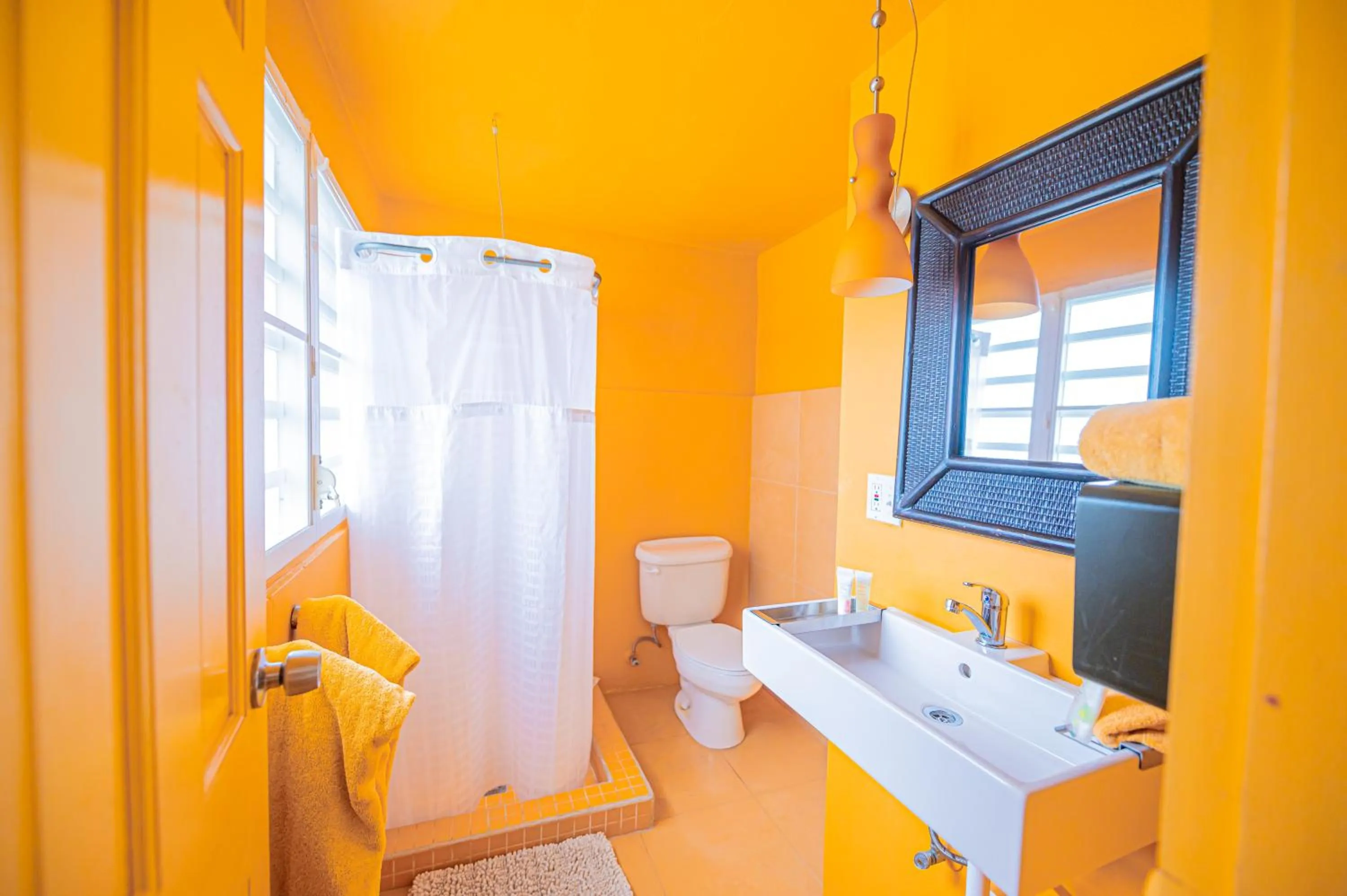 Bathroom in Casa de Amistad Guesthouse