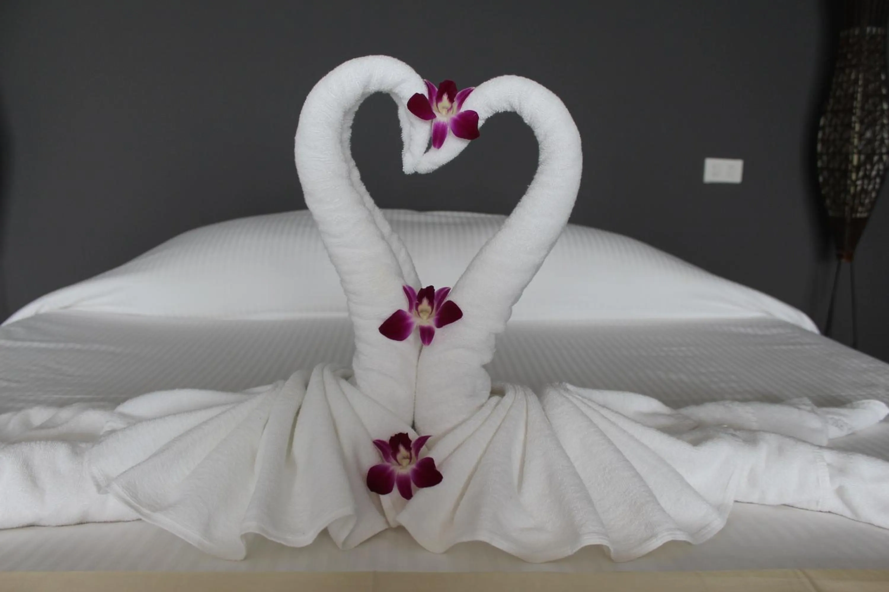 Bed in Katriya Hotel and Tower