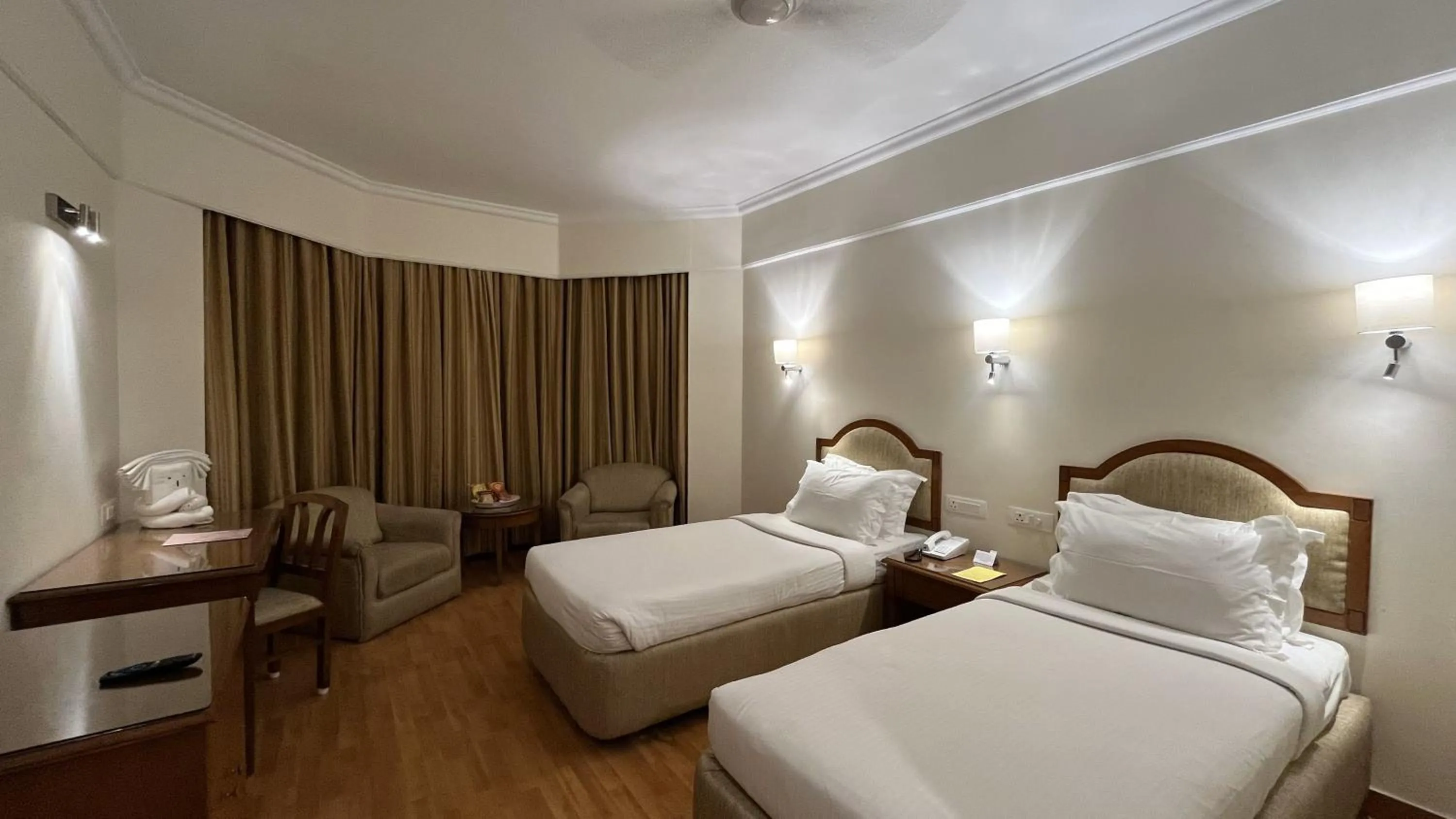 Bed in Katriya Hotel and Tower
