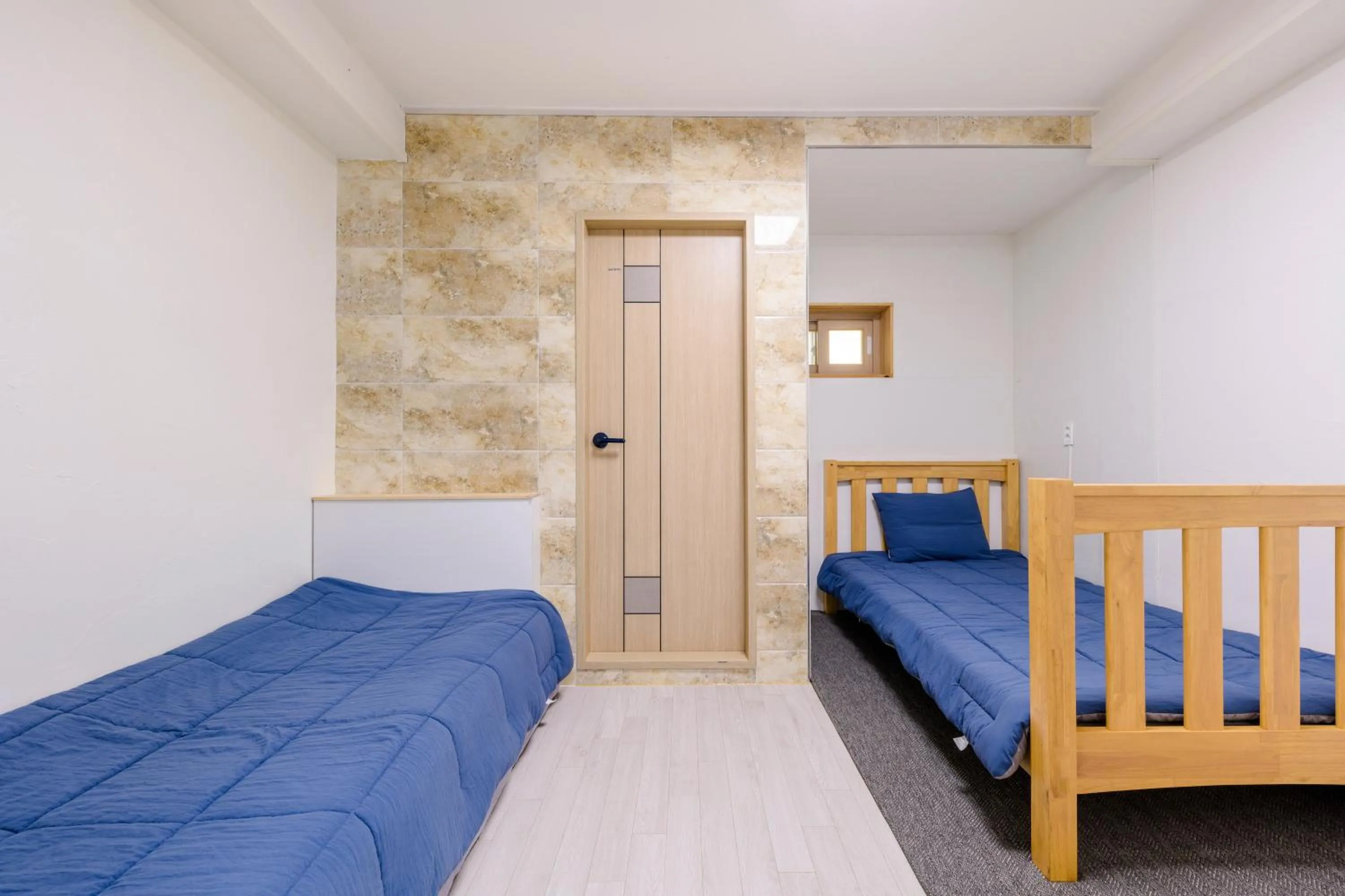 Bed in Jeju Turning point Pension