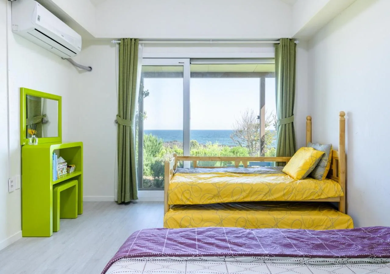 Bed in Jeju Turning point Pension