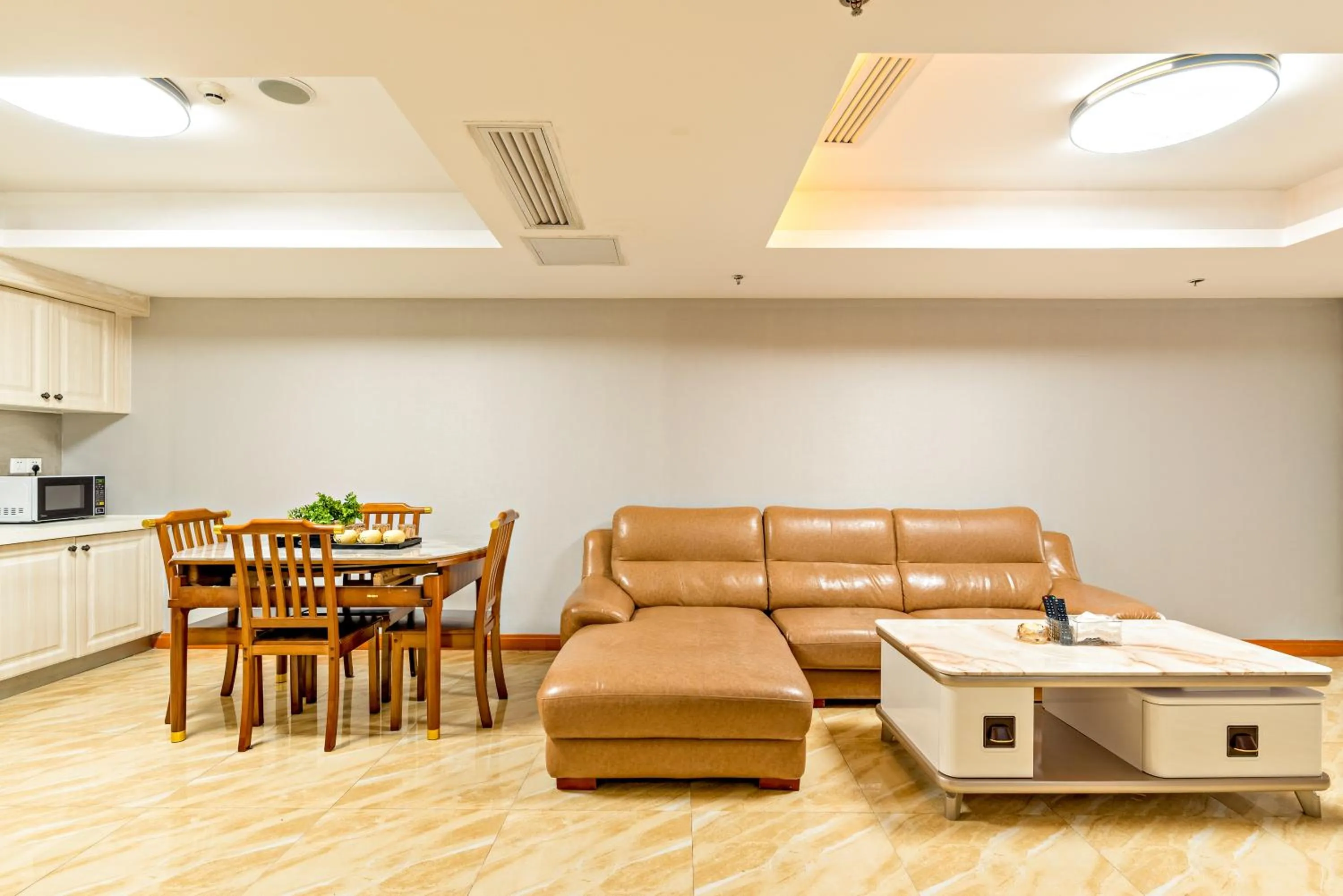 Living room in Guangzhou Manhattan International Apartment Zhengjia Free bus services are provided for the first and second phases