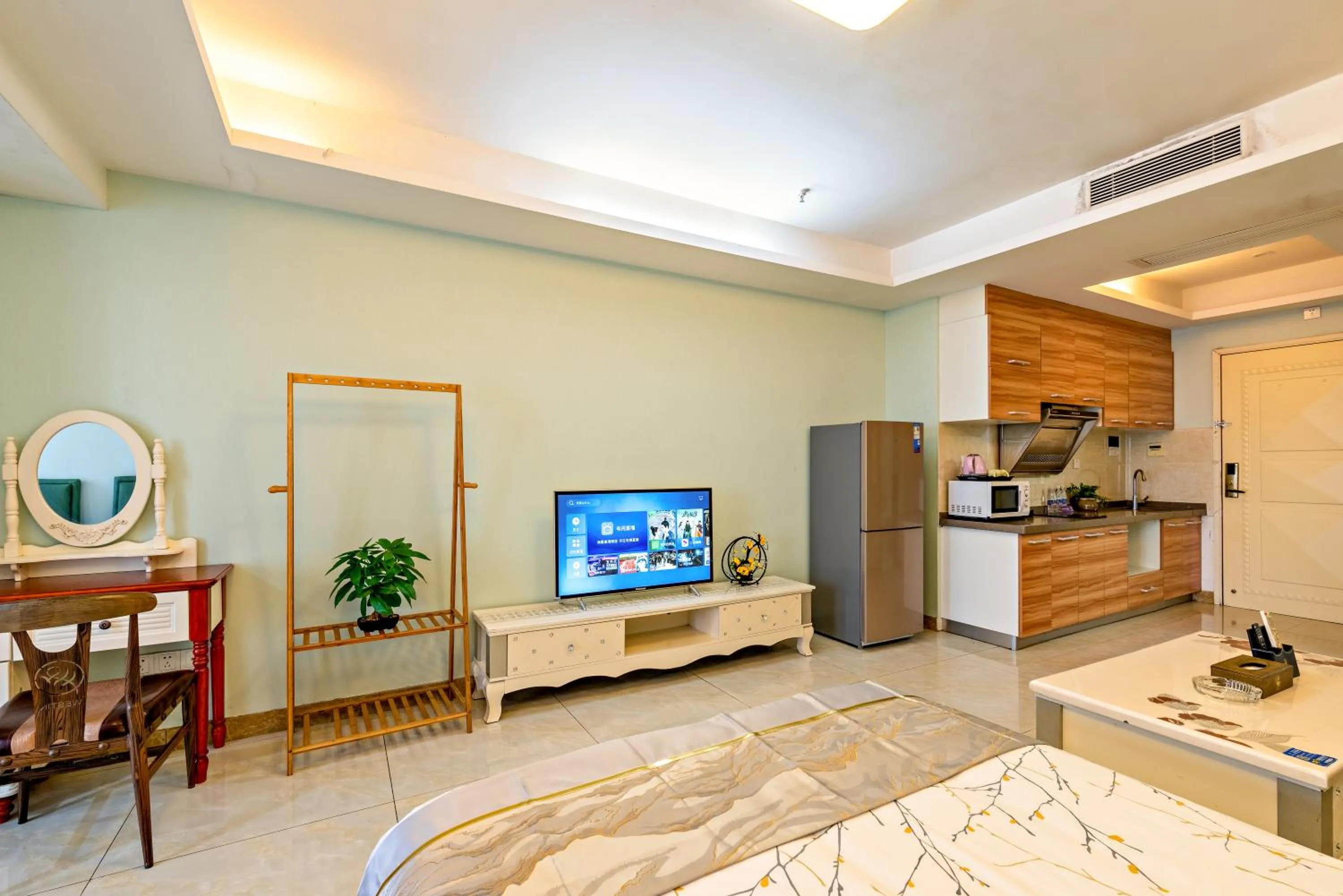 TV and multimedia in Guangzhou Manhattan International Apartment Zhengjia Free bus services are provided for the first and second phases