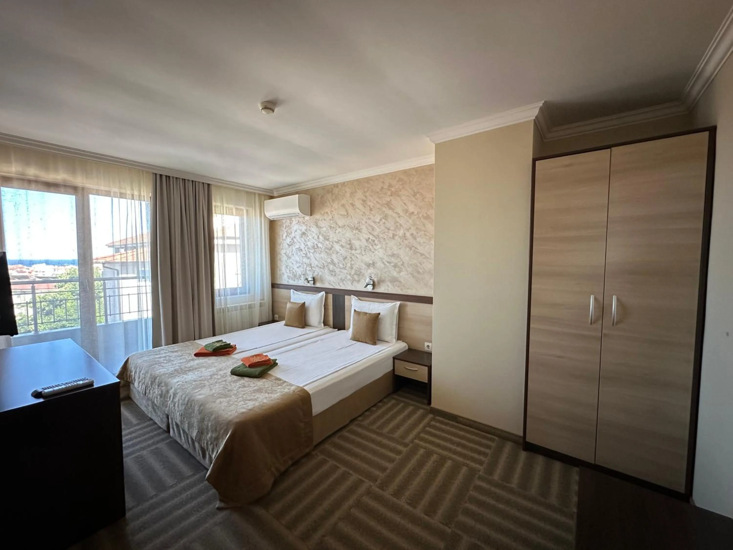 Bed in Family Hotel Radiana