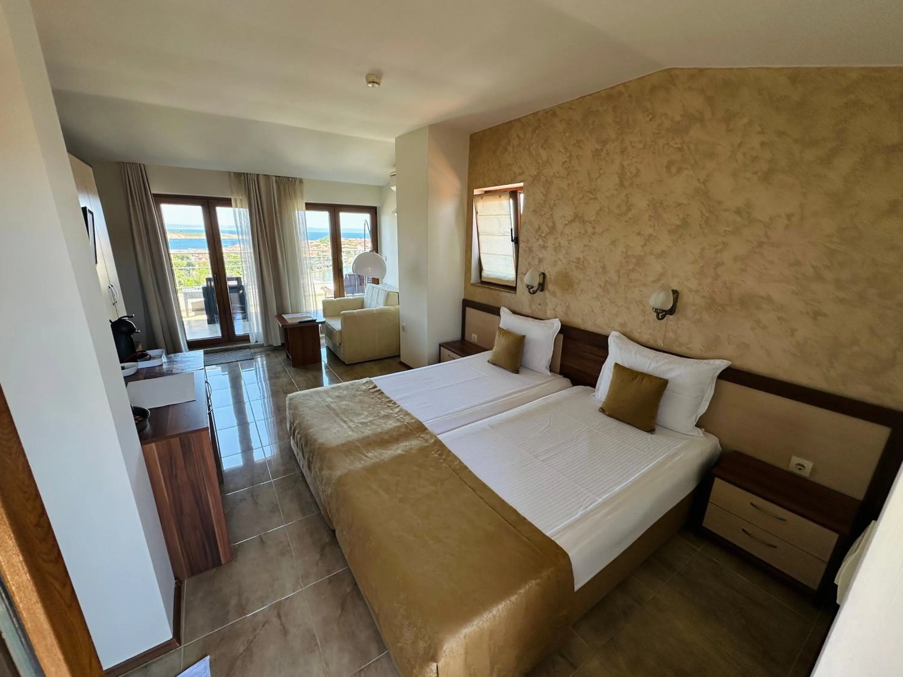 Bed in Family Hotel Radiana