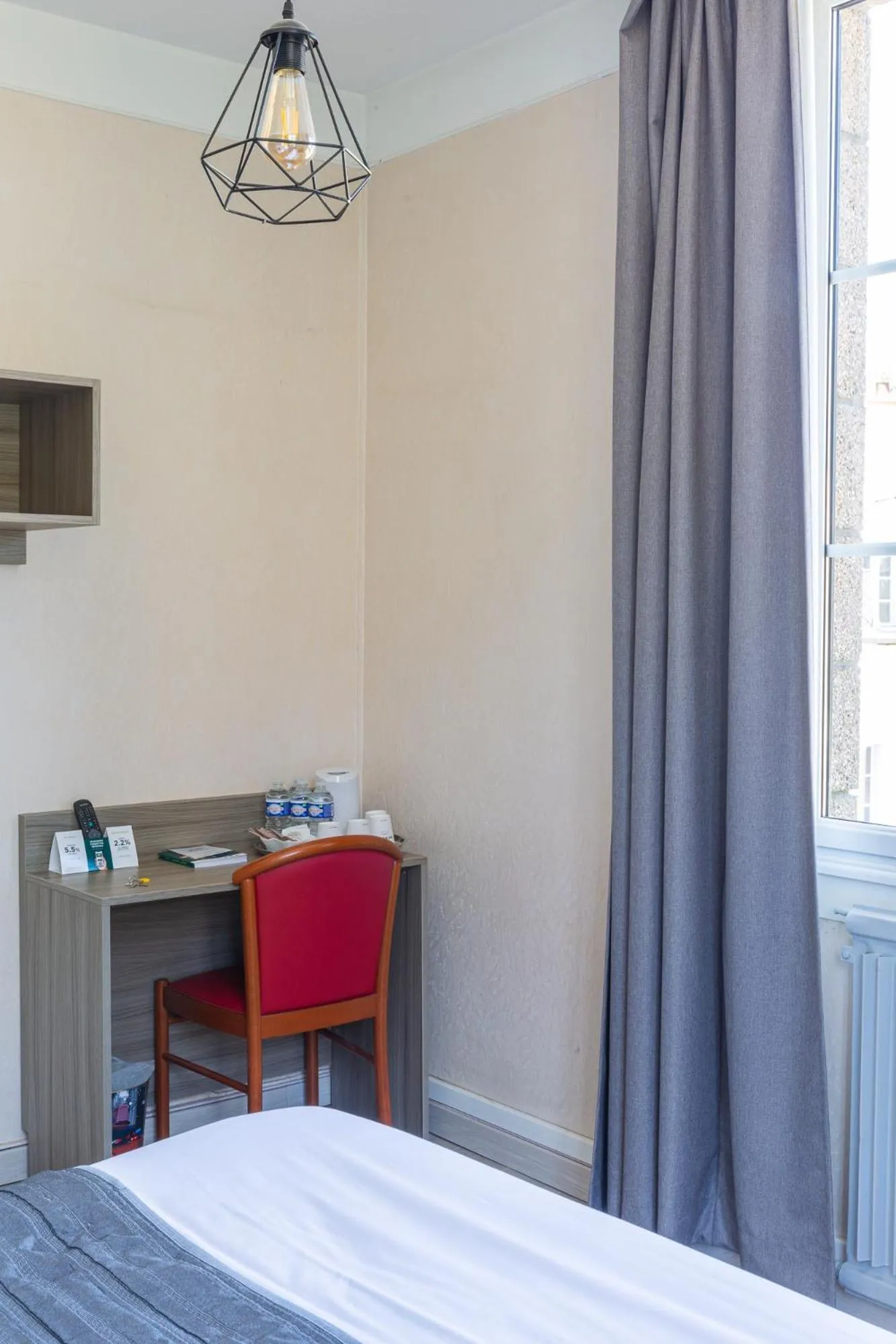 Bedroom in Hôtel Restaurant Du Château