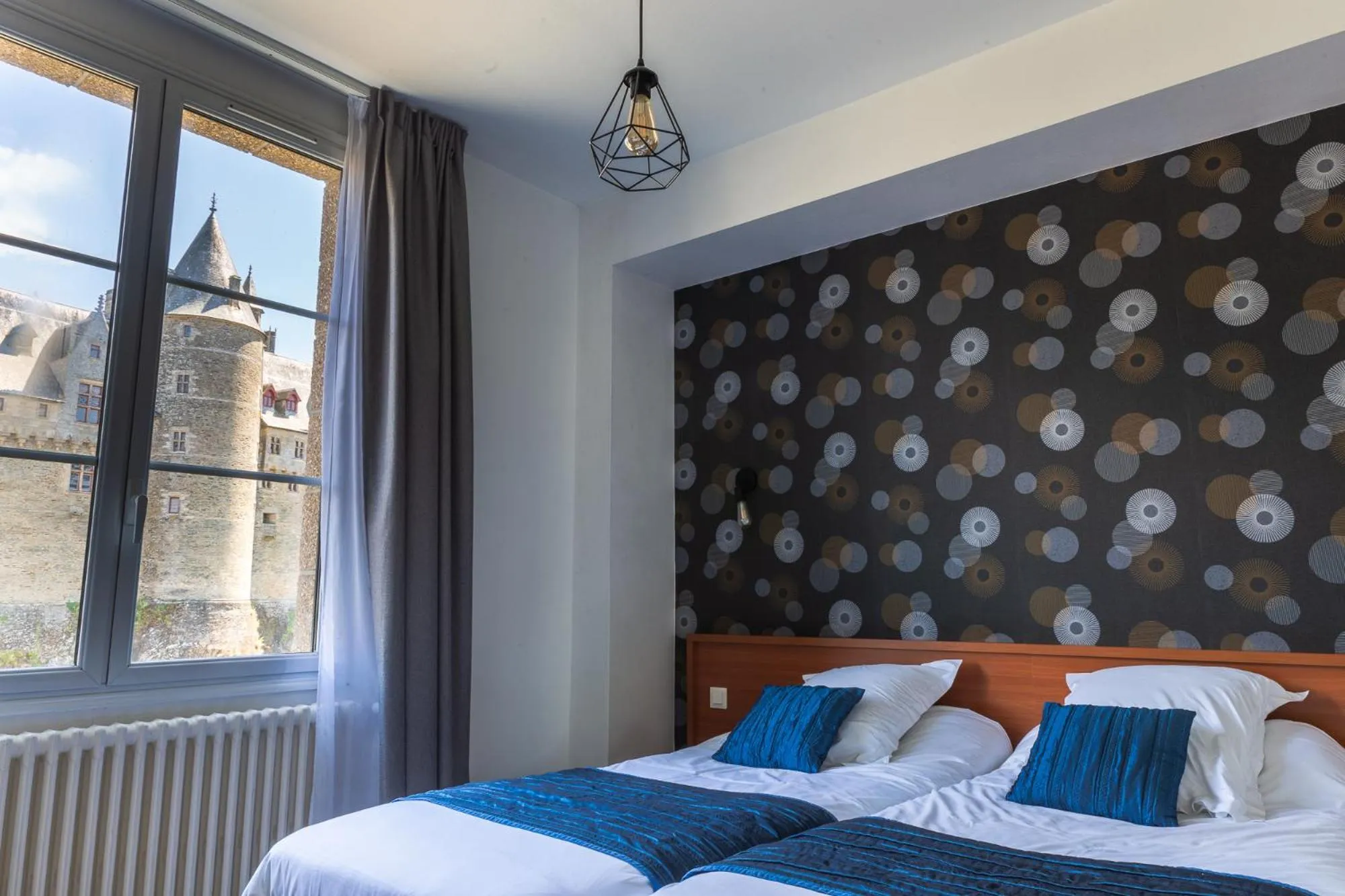 Bedroom in Hôtel Restaurant Du Château