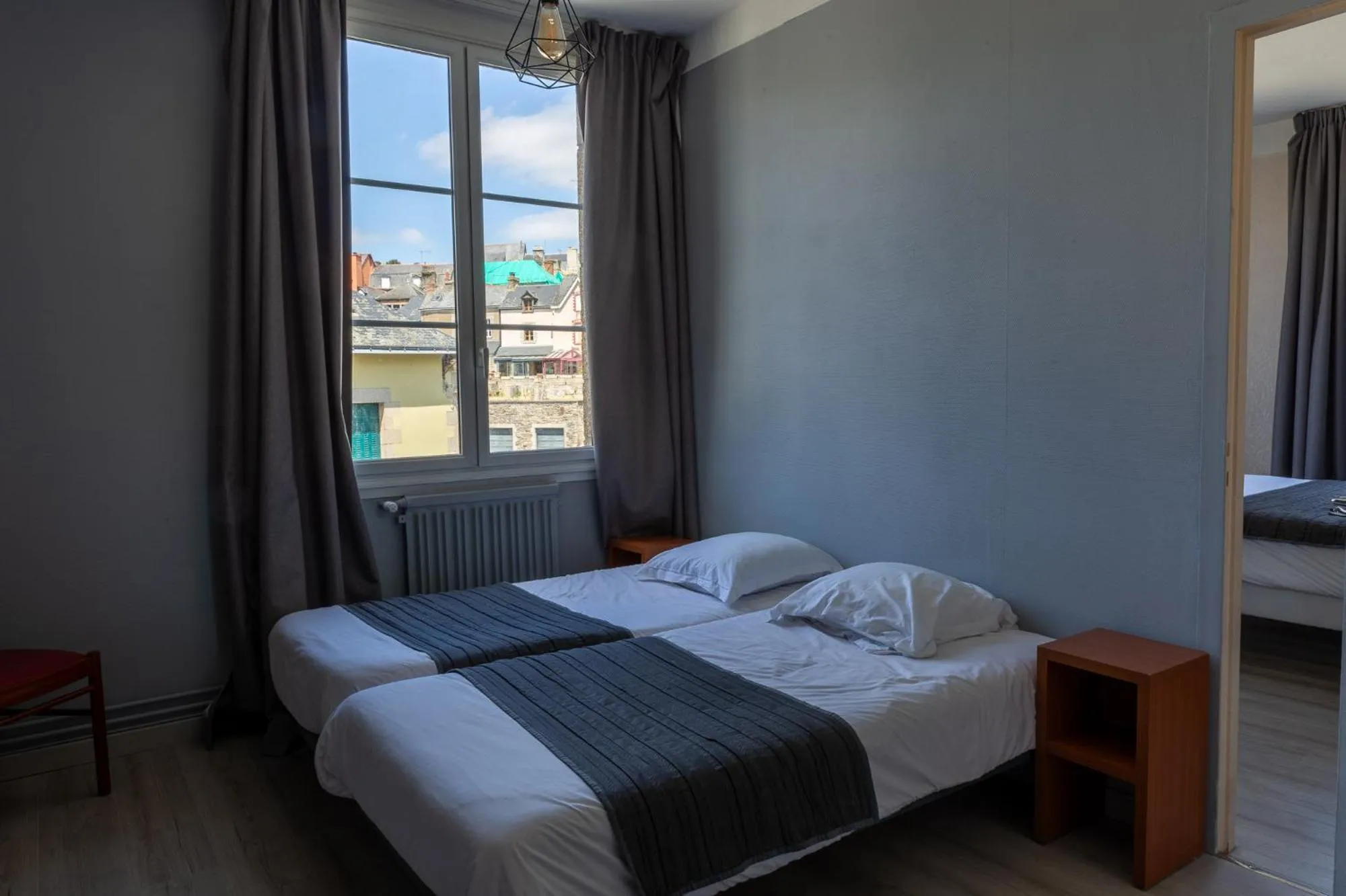 Bedroom in Hôtel Restaurant Du Château